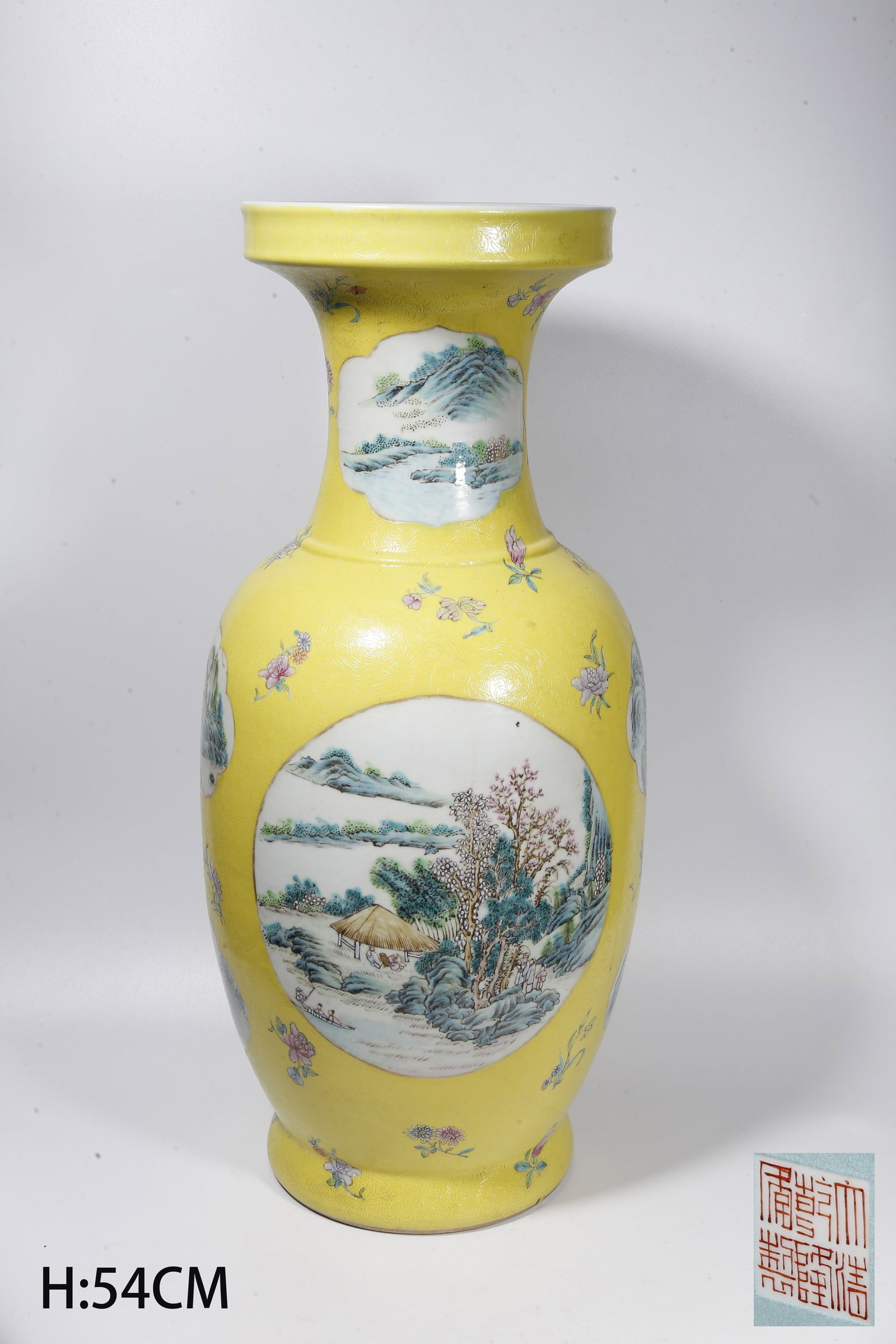A YELLOW GROUND INCISED WINDOWED FAMILLE ROSE WIDE-MOUTH VASE WITH LANDSCAPE MOTIFS: Yellow Ground Incised Windowed Famille Rose Wide-Mouth Vase with Landscape Motifs
