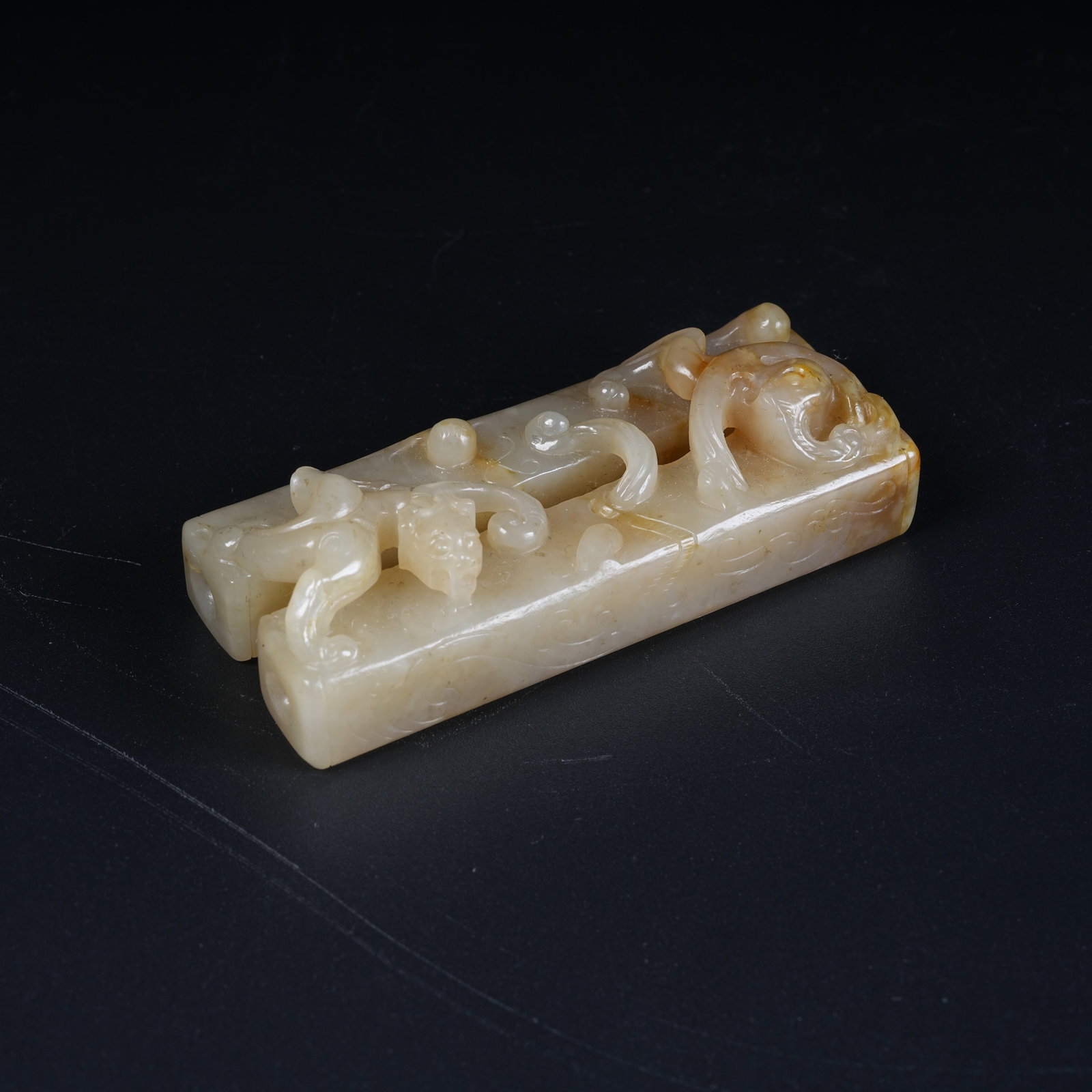 A ANCIENT JADE DOUBLE-JOINT TUBE PENDANT CARVED WITH CHI DRAGON PATTERN: Ancient Jade Double-joint Tube Pendant Carved with Chi Dragon Pattern