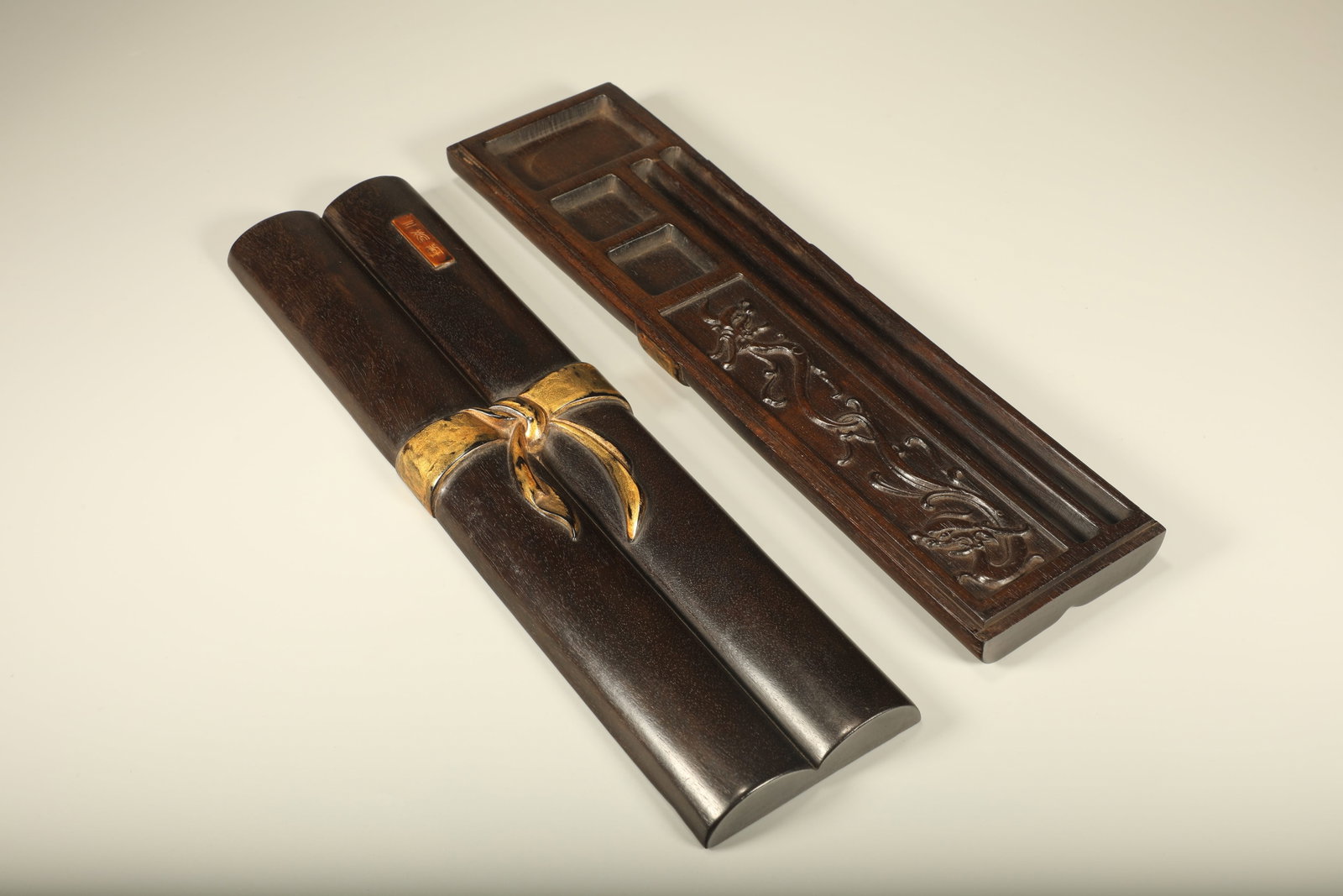 A ZITAN WOOD SCHOLAR'S BOX CARVED WITH RIBBON PATTERNS AND GILDED CALLIGRAPHY (1 of 8)