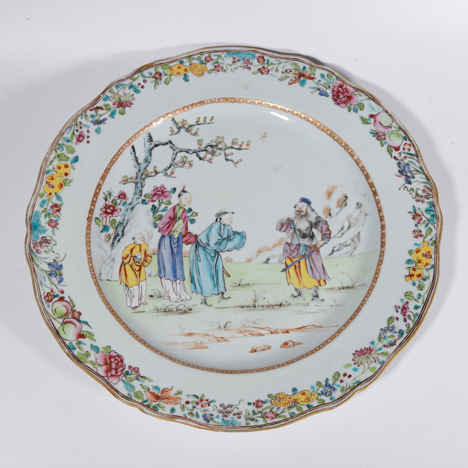 A FAMILLE ROSE PLATE WITH FIGURE STORY SCENES: Famille Rose Plate with Figure Story Scenes