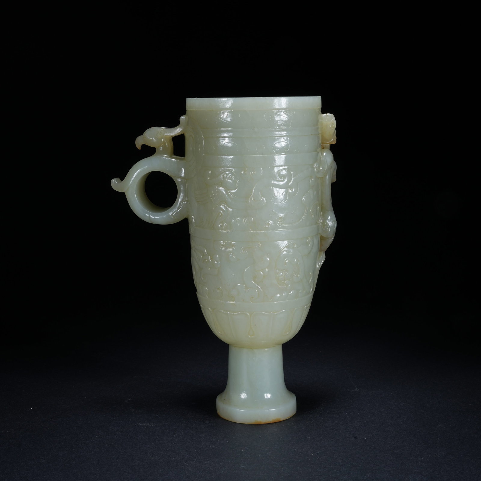 A PHOENIX-HEADED STEM CUP IN HETIAN JADE (1 of 10)