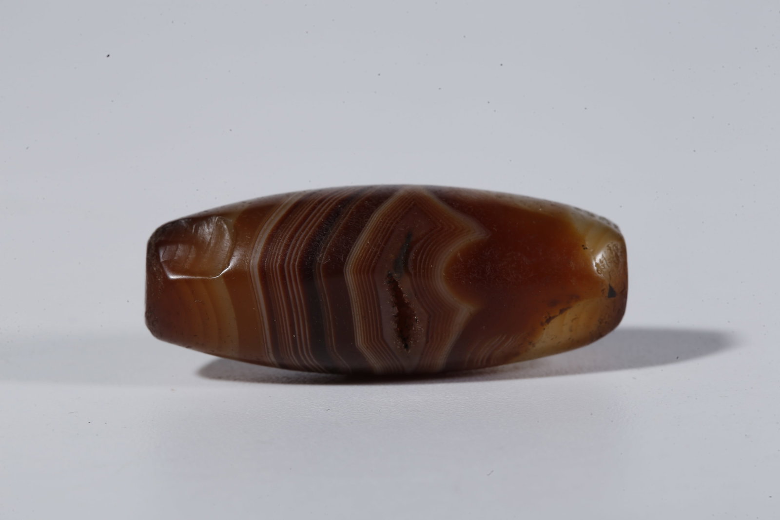 A THREAD-WRAPPED AGATE DZI BEAD - 2