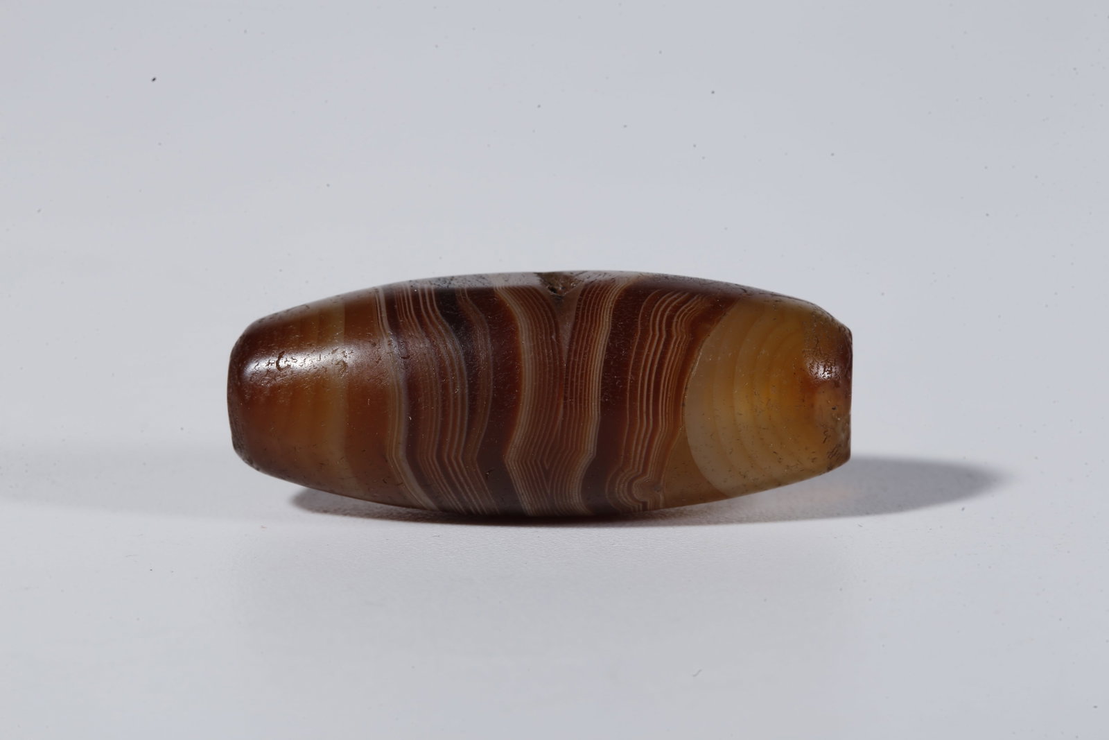 A THREAD-WRAPPED AGATE DZI BEAD - 3