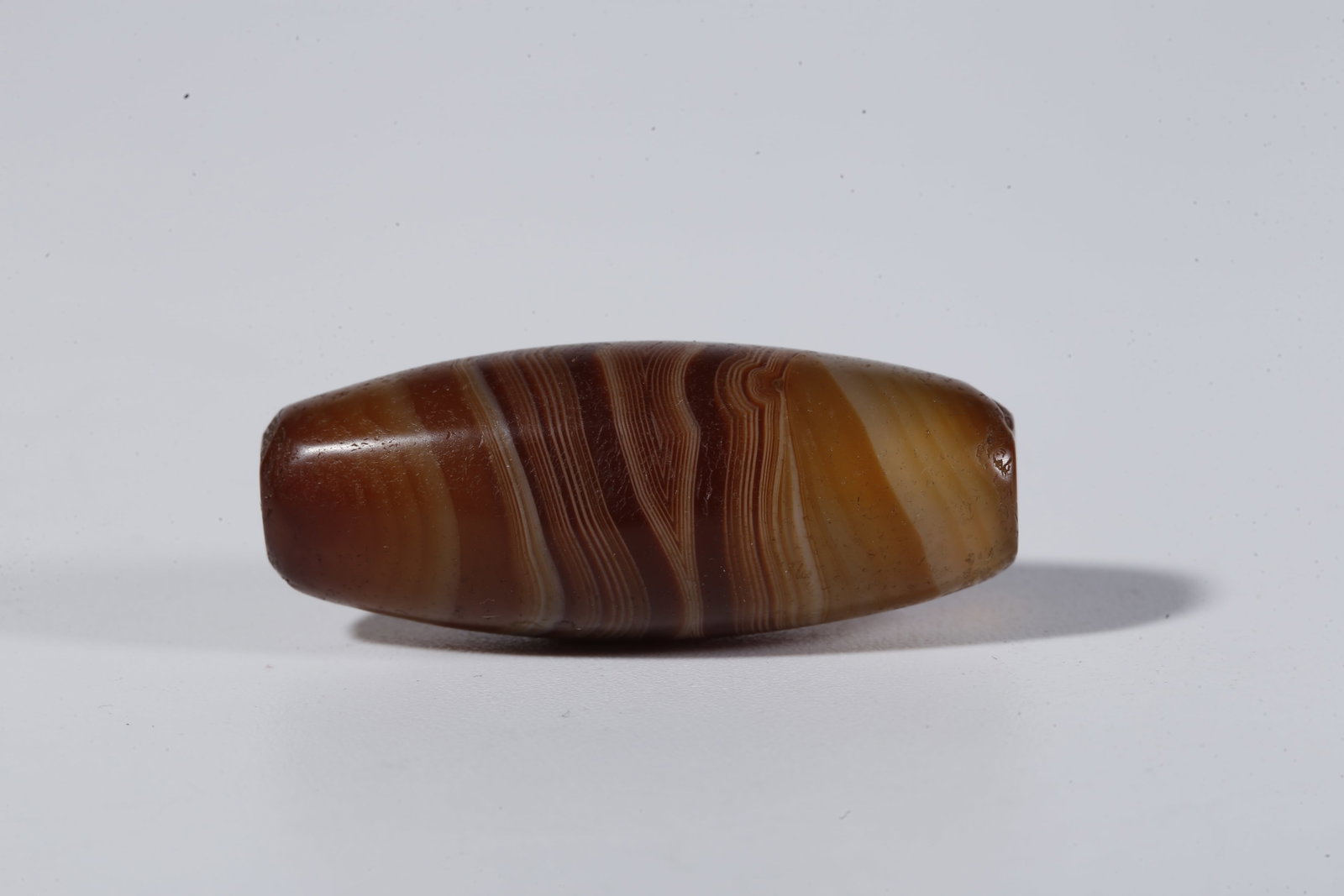 A THREAD-WRAPPED AGATE DZI BEAD - 4
