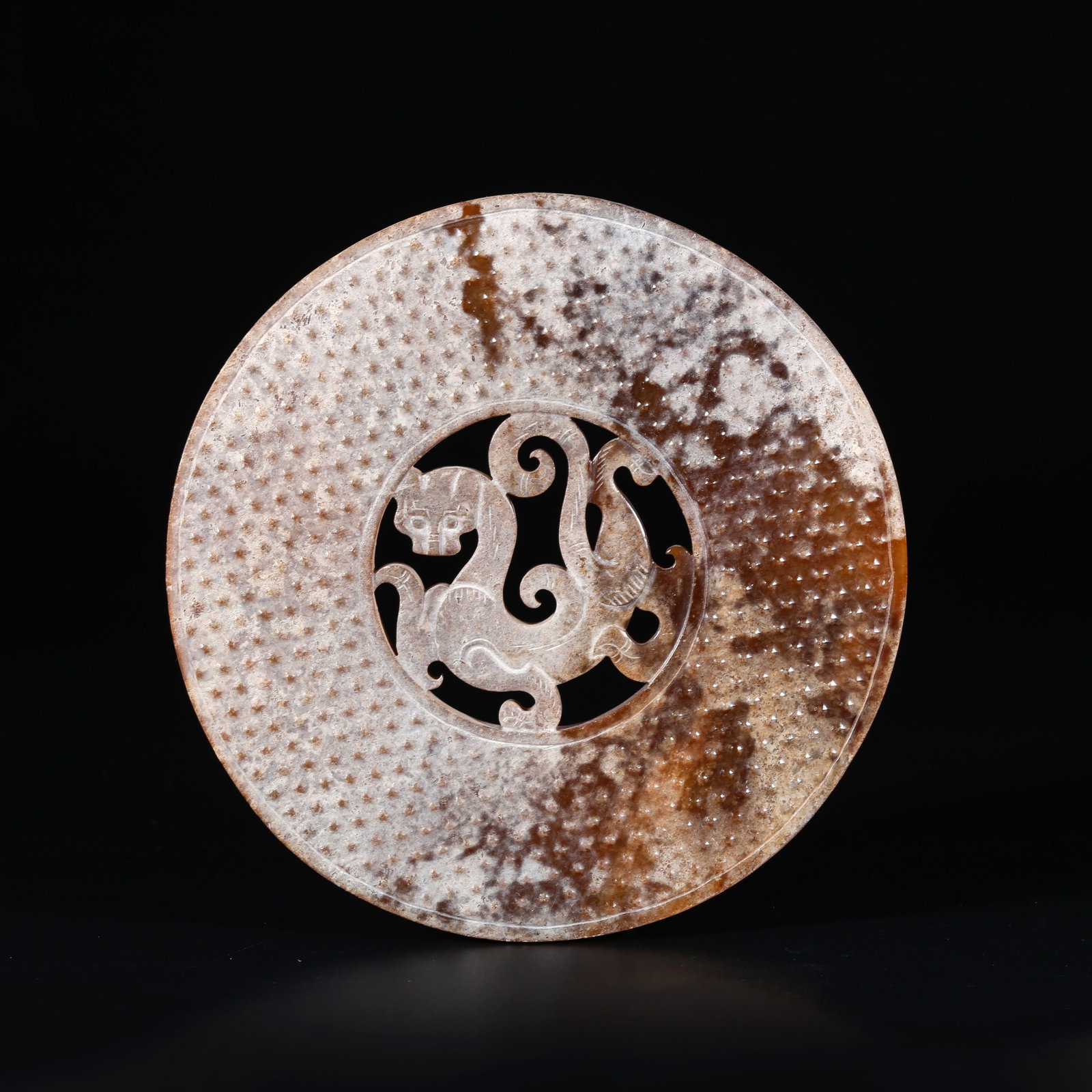 A ANCIENT JADE BI DISC CARVED WITH DRAGON PATTERNS: Ancient Jade Bi Disc Carved with Dragon Patterns