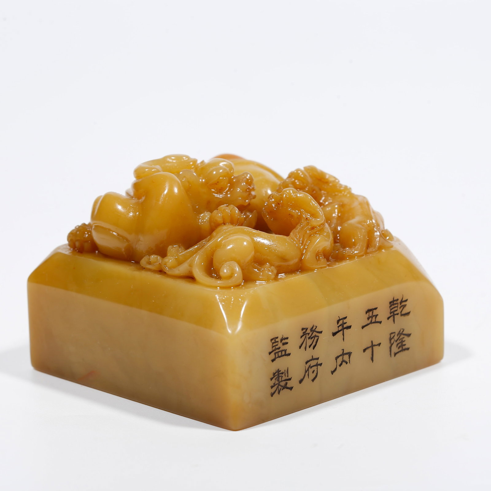 A SHOUSHAN TIANHUANG STONE SEAL CARVED WITH BEAST KNOB: Shoushan Tianhuang Stone Seal Carved with Beast Knob