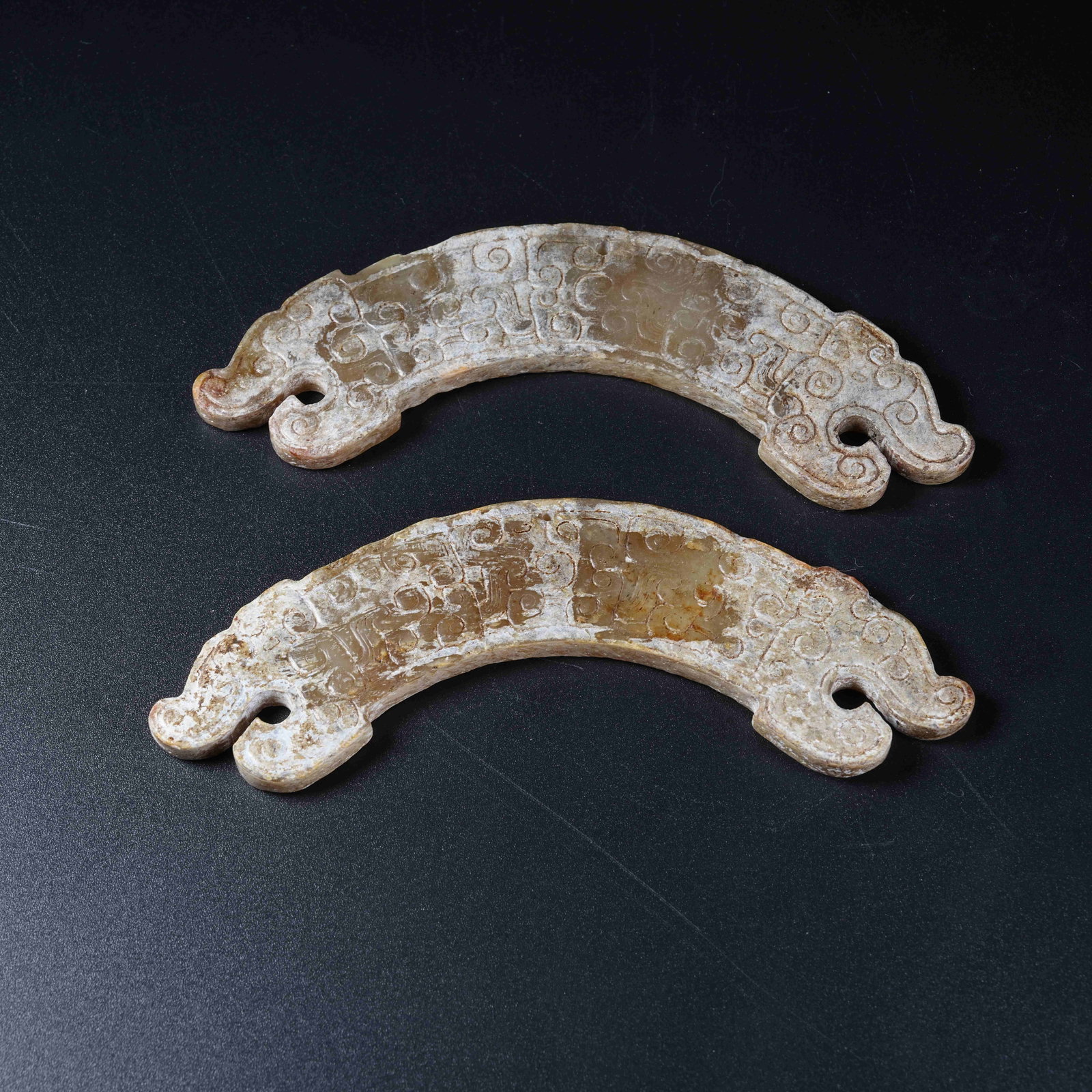 A SET OF ANCIENT JADE HUANG WITH DOUBLE DRAGON MOTIFS: Set of Ancient Jade Huang with Double Dragon Motifs
