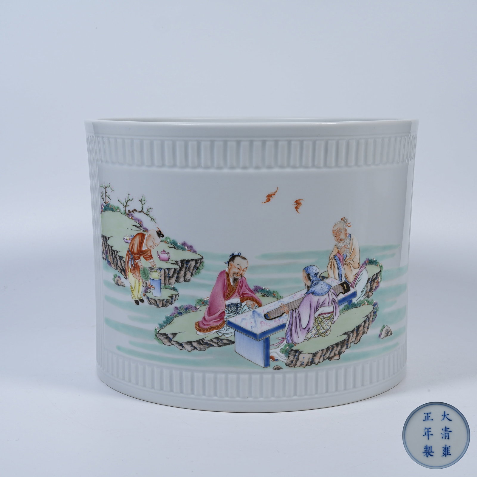 A LARGE FAMILLE ROSE BRUSH POT WITH NARRATIVE FIGURE SCENES (1 of 9)