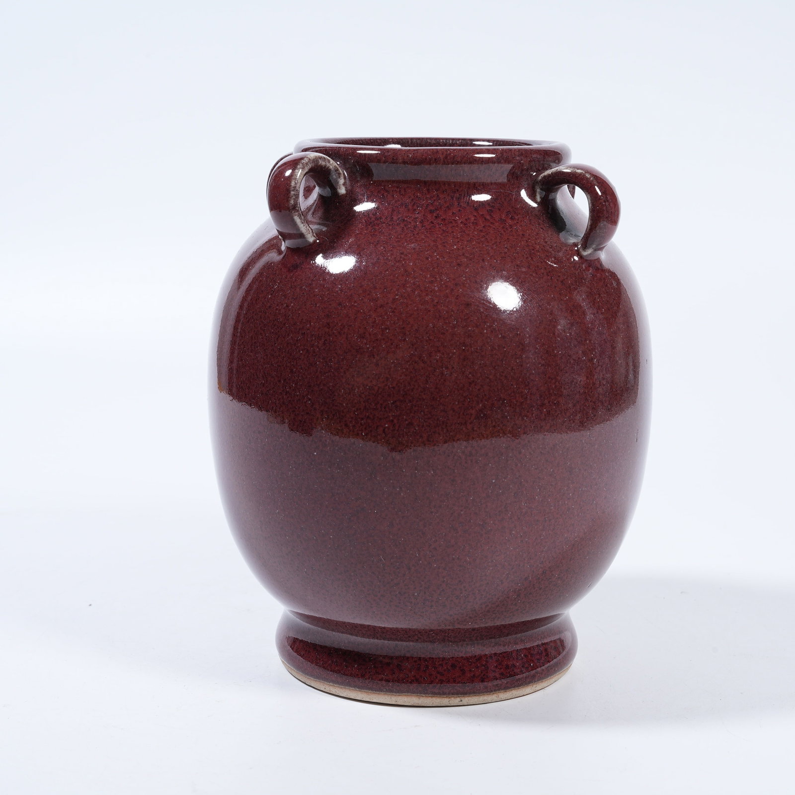 A BEAN RED GLAZE FOUR-LOOP JAR - 2