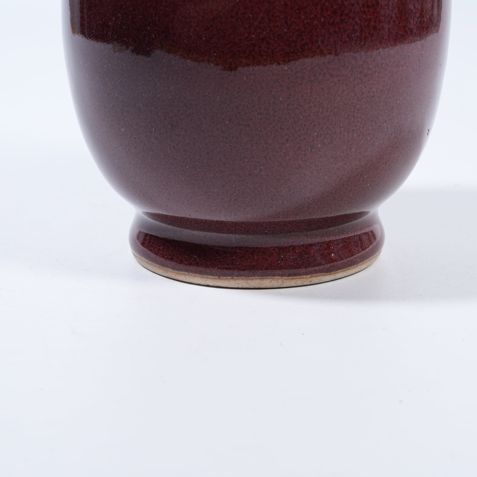 A BEAN RED GLAZE FOUR-LOOP JAR - 6
