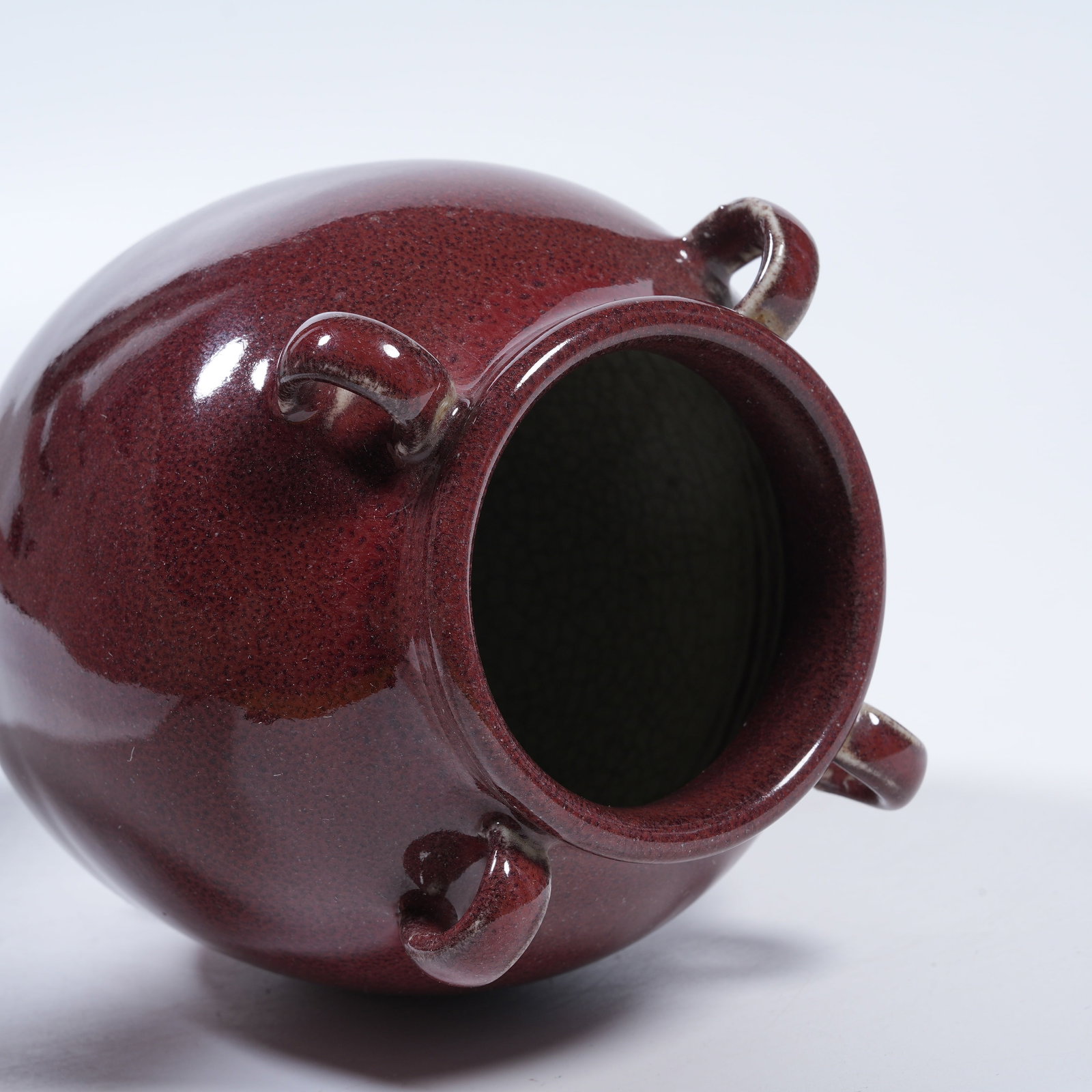 A BEAN RED GLAZE FOUR-LOOP JAR - 8