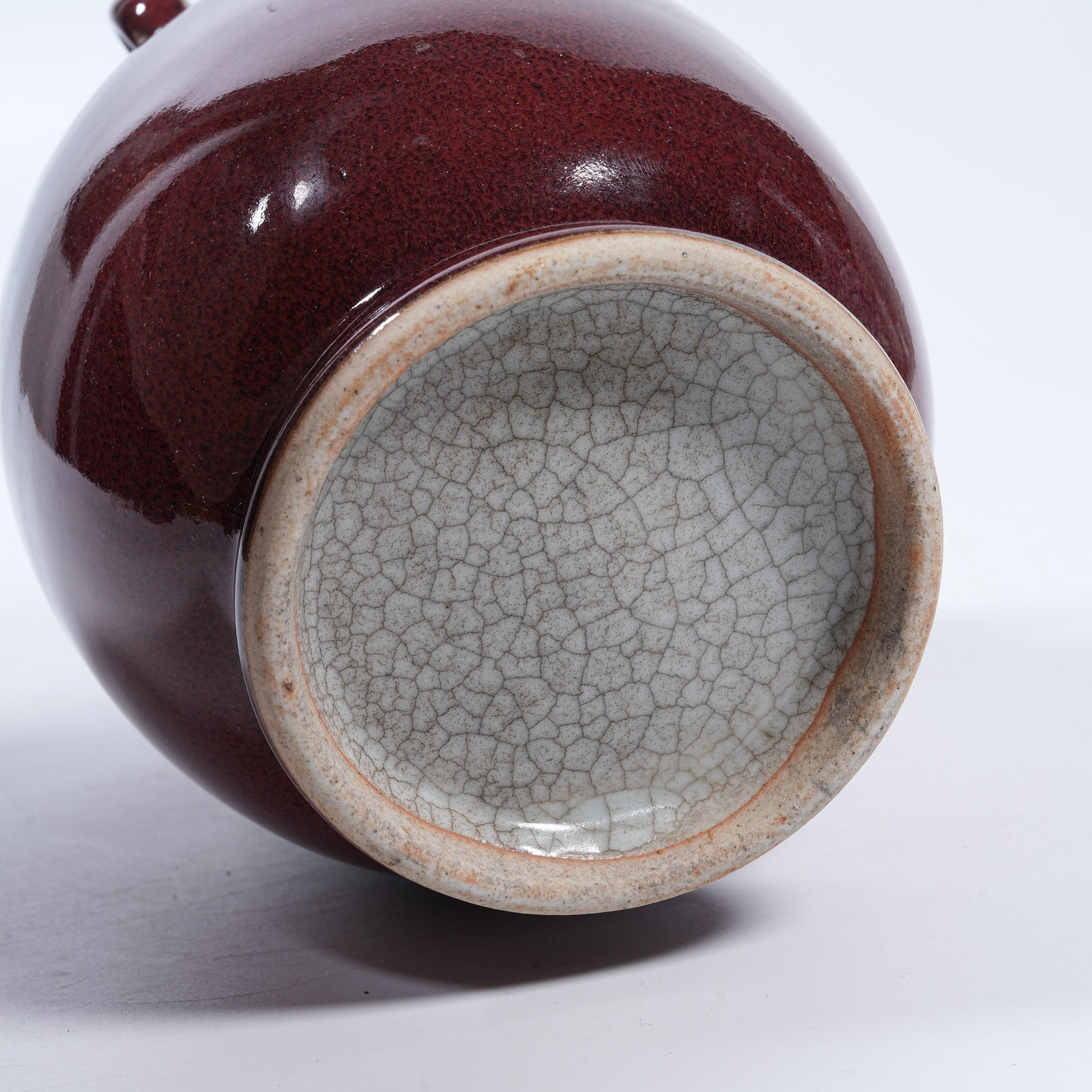 A BEAN RED GLAZE FOUR-LOOP JAR - 9