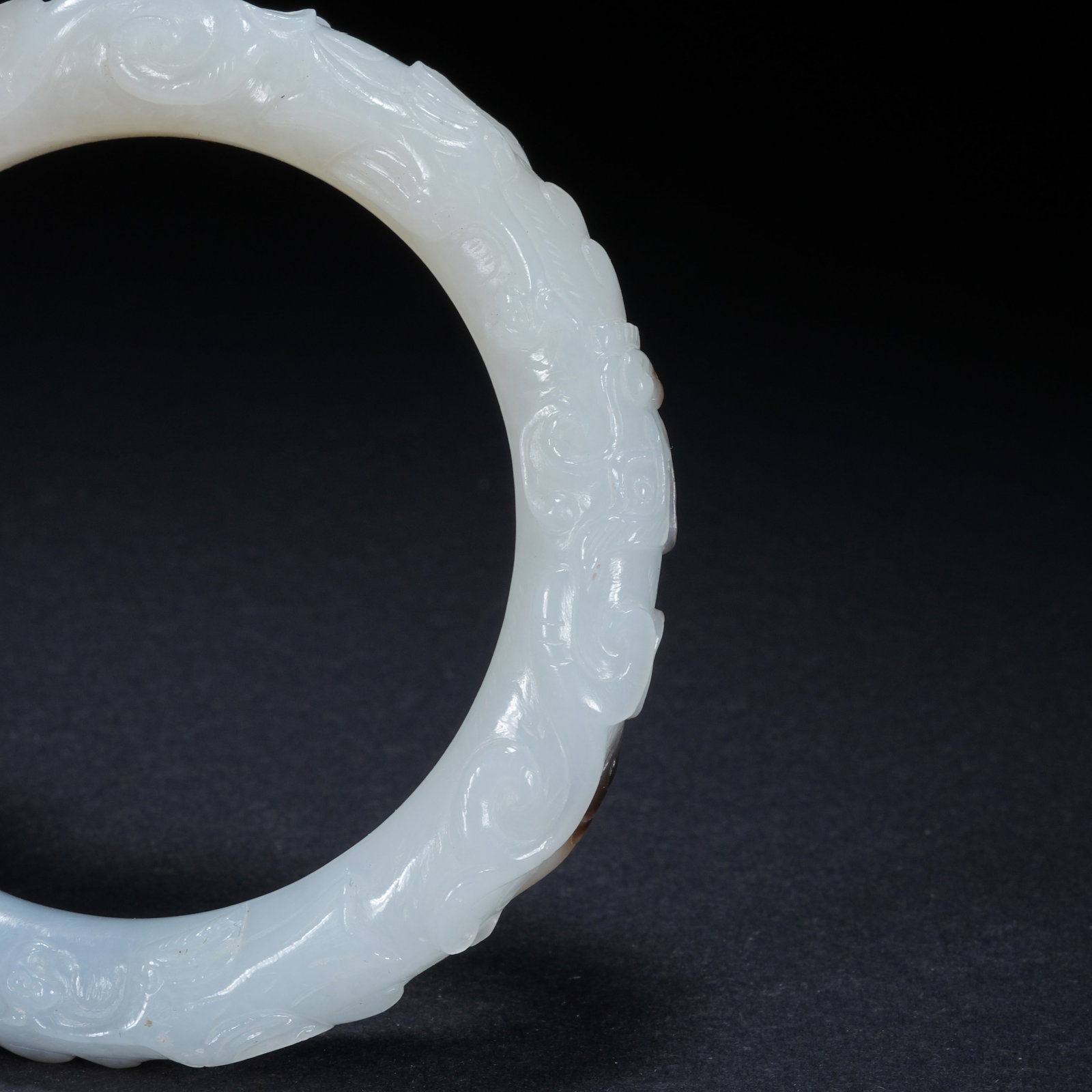 A HETIAN JADE BANGLE WITH SKILLFULLY COLORED DRAGON PATTERN - 9