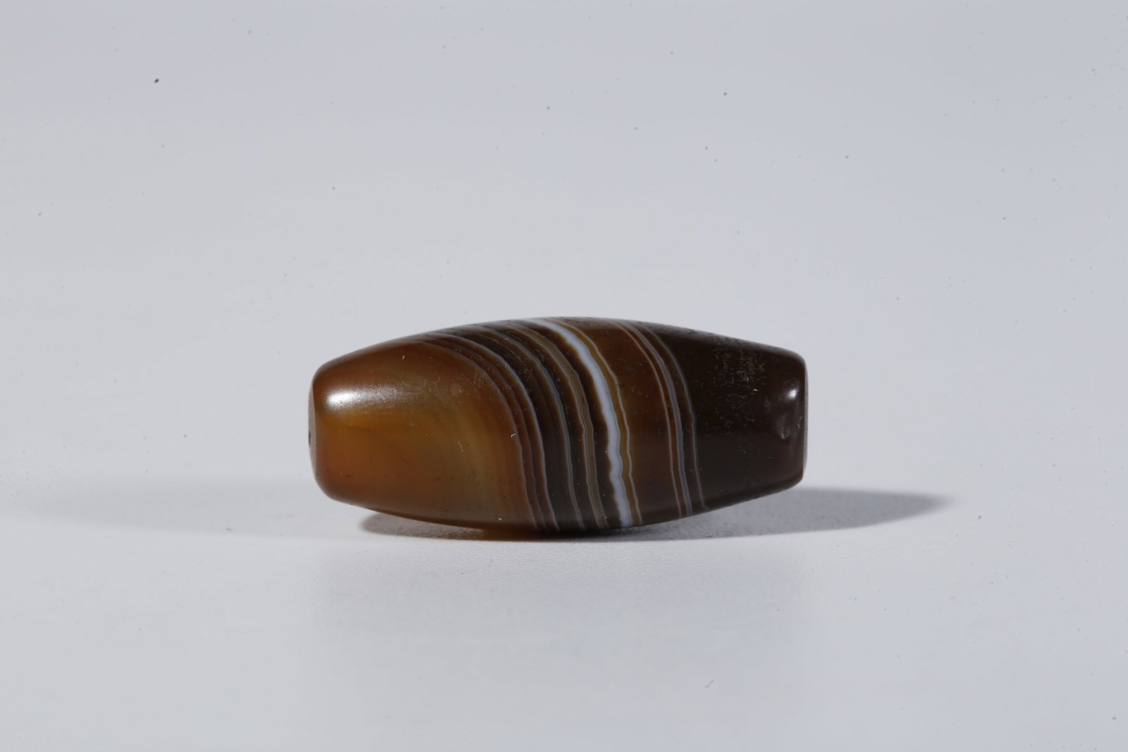 A THREAD-WRAPPED AGATE DZI BEAD - 2