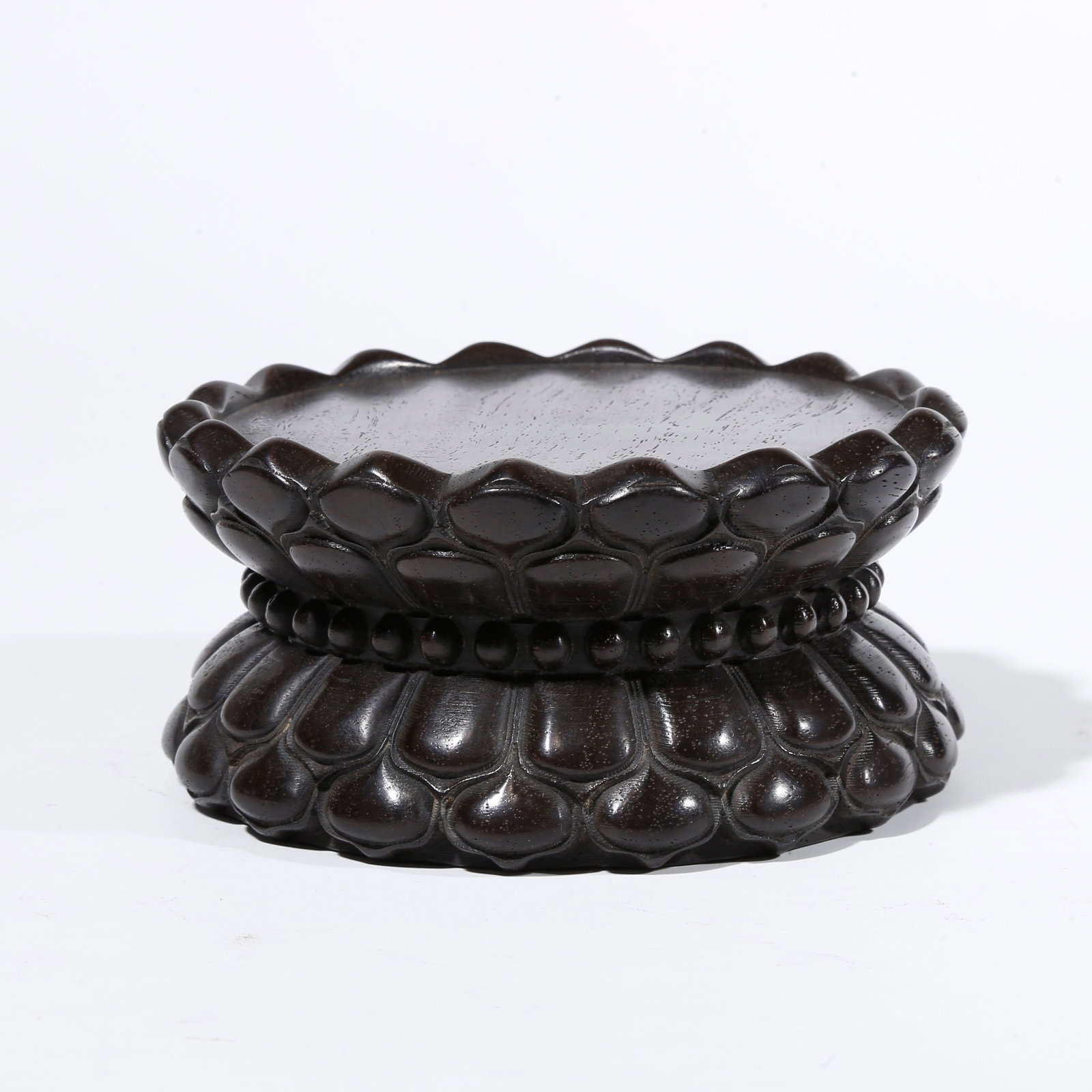 A RED SANDALWOOD CARVED LOTUS-SHAPED BASE: Red Sandalwood Carved Lotus-shaped Base