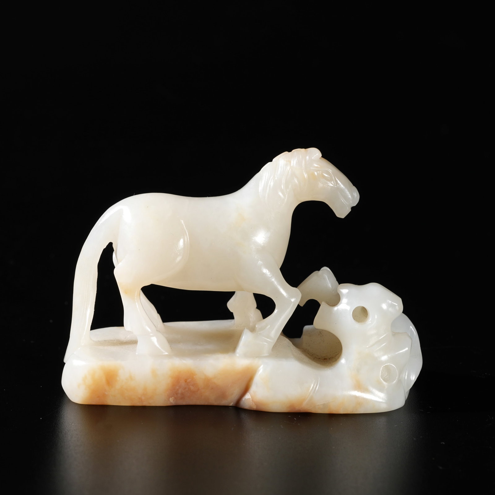 A HETIAN JADE CARVED STEED-FORM ORNAMENT (1 of 9)