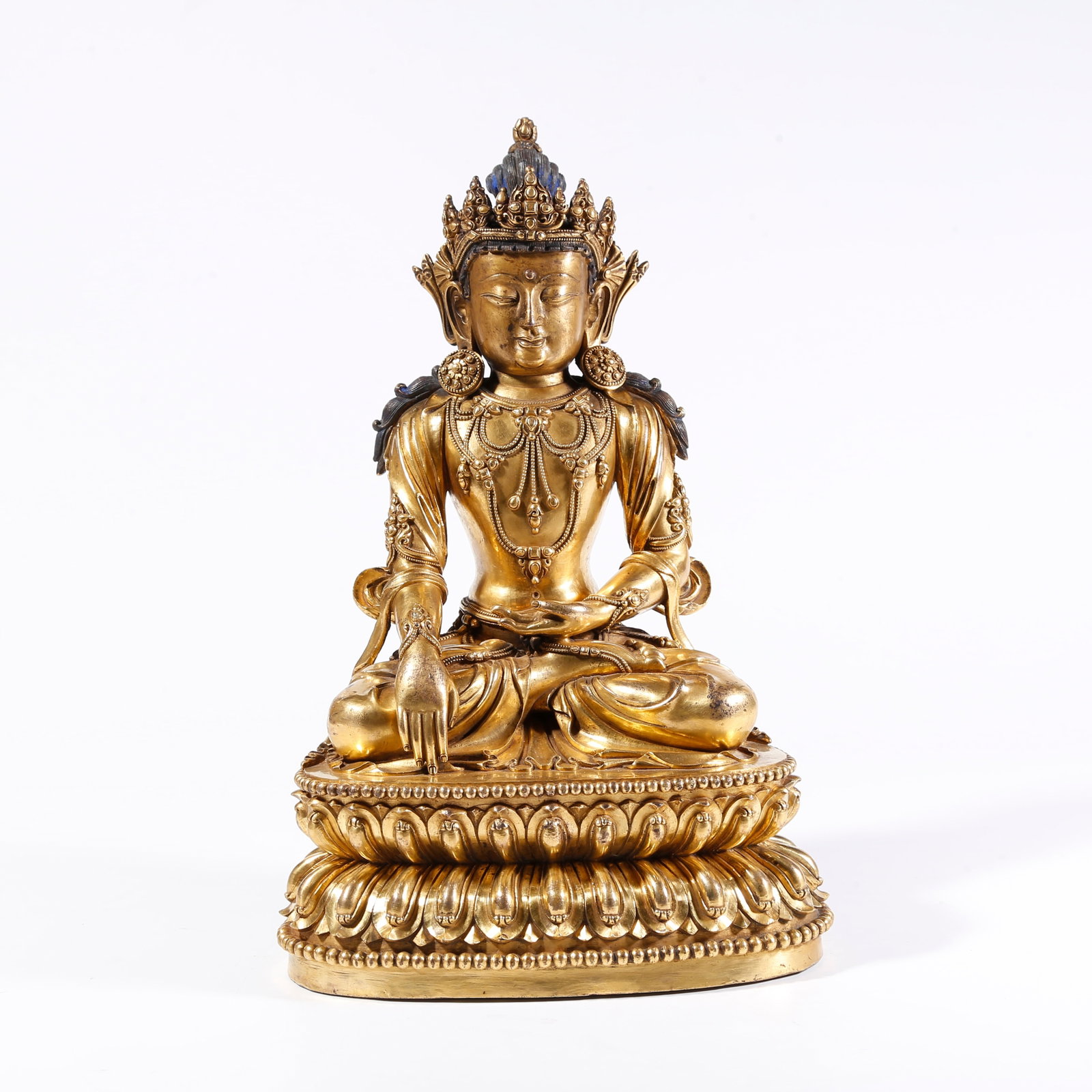 A GILT-BRONZE SHAKYAMUNI BUDDHA FIGURE (1 of 9)