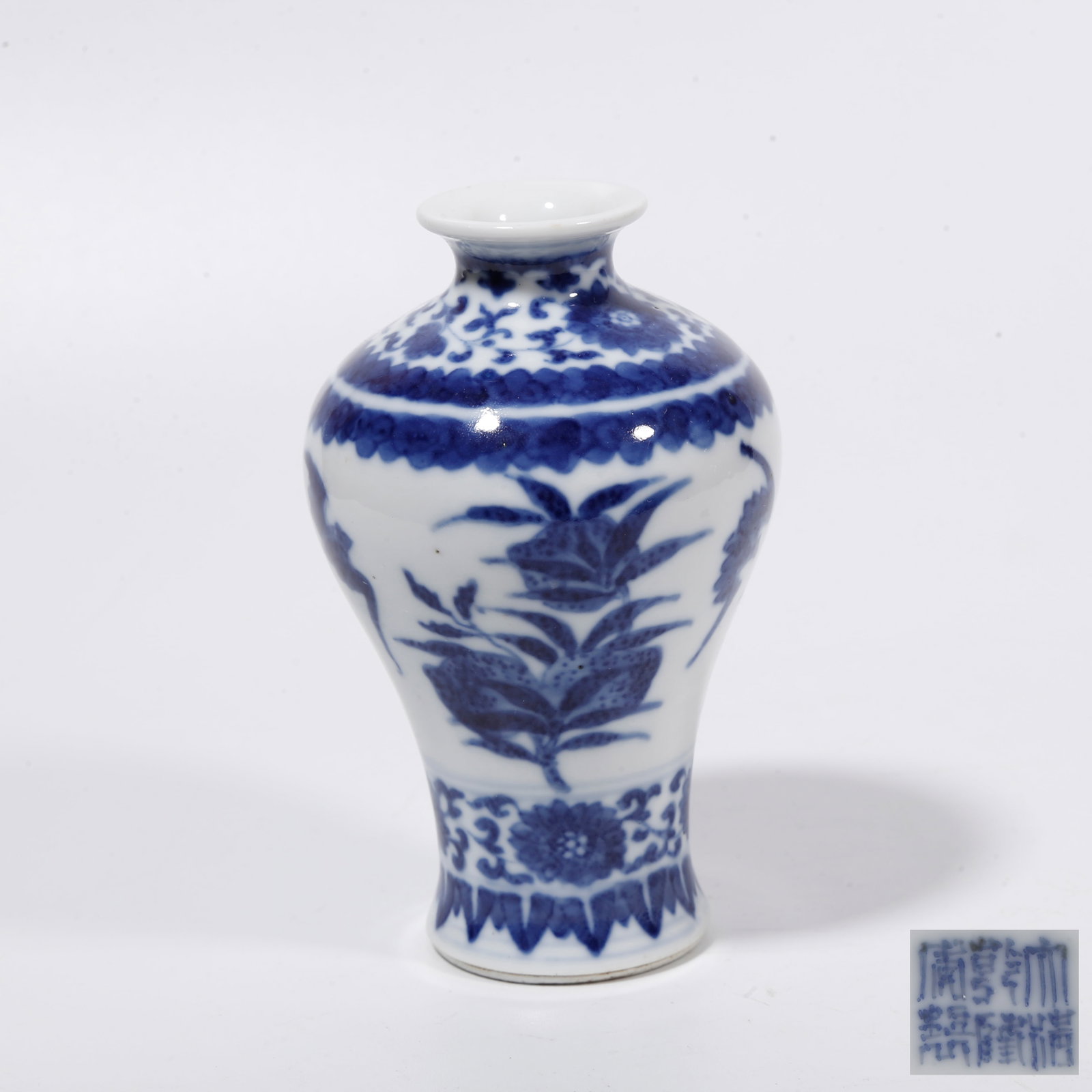 A BLUE AND WHITE PLUM VASE WITH FORTUNE AND LONGEVITY PATTERNS: Blue and White Plum Vase with Fortune and Longevity Patterns