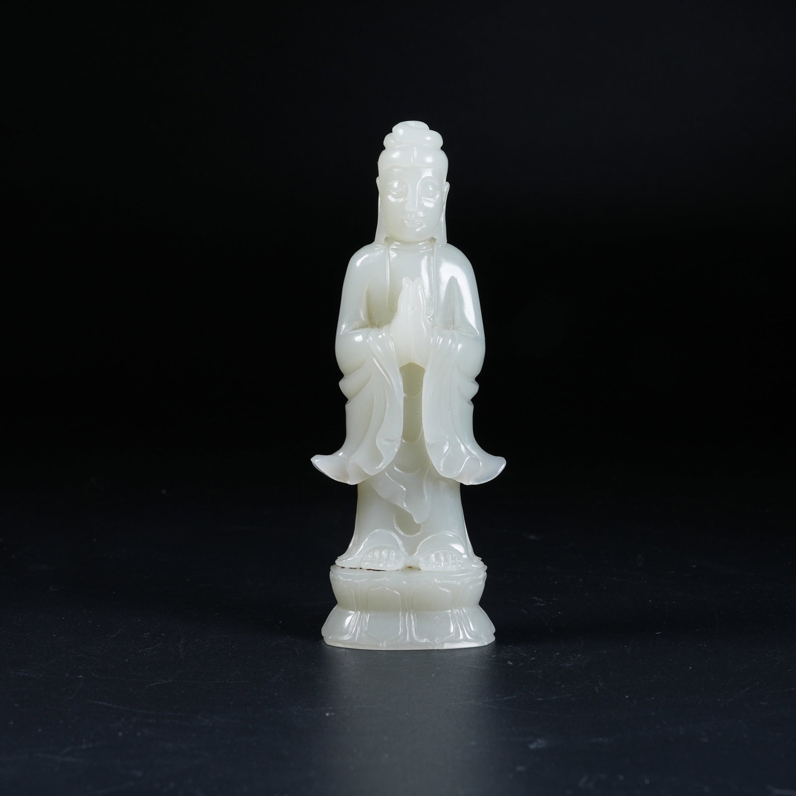 A STANDING BUDDHA STATUE OF HETIAN JADE: Standing Buddha Statue of Hetian Jade