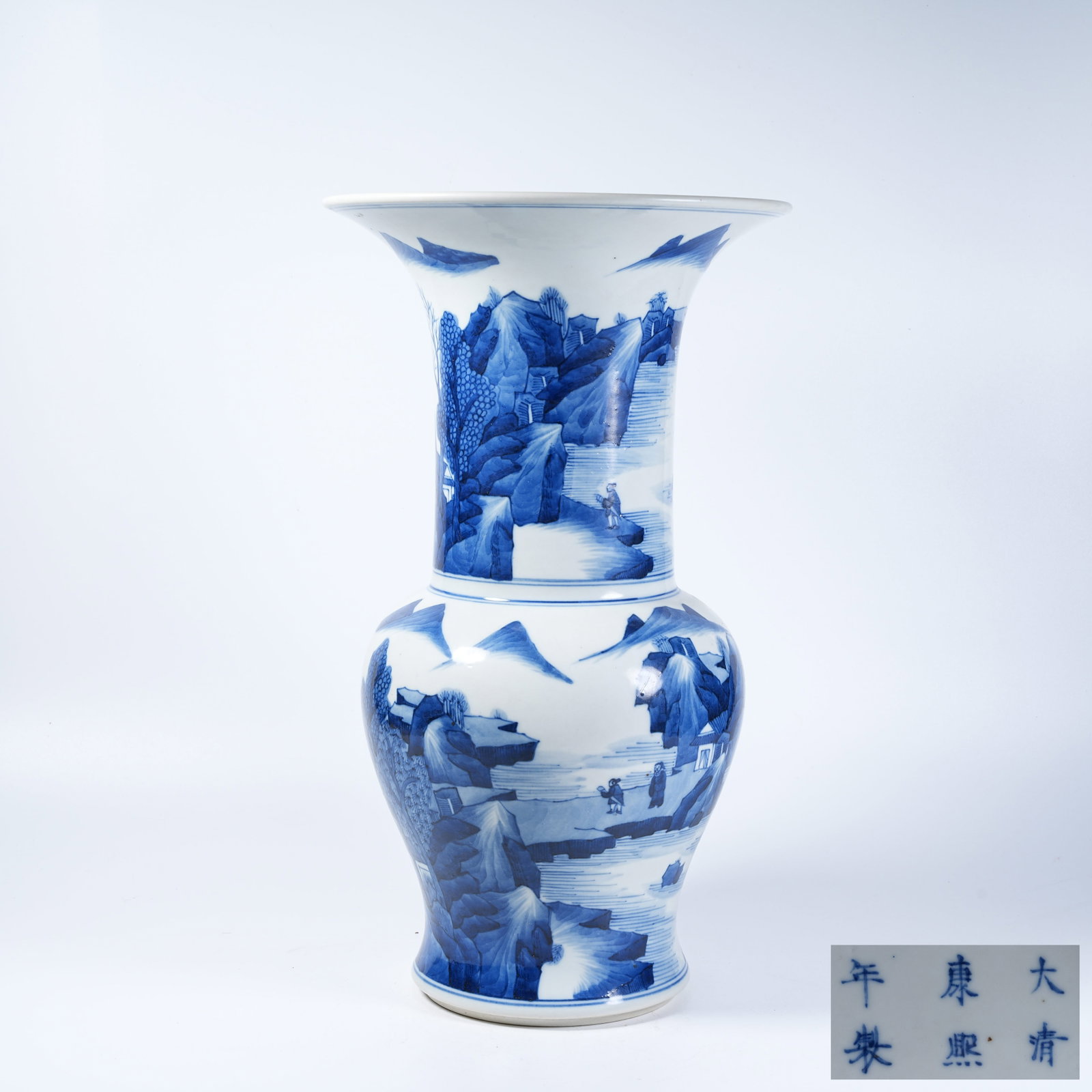 A PHOENIX-TAILED ZUN VESSEL WITH BLUE AND WHITE LANDSCAPE PAVILION MOTIFS: Phoenix-Tailed Zun Vessel with Blue and White Landscape Pavilion Motifs