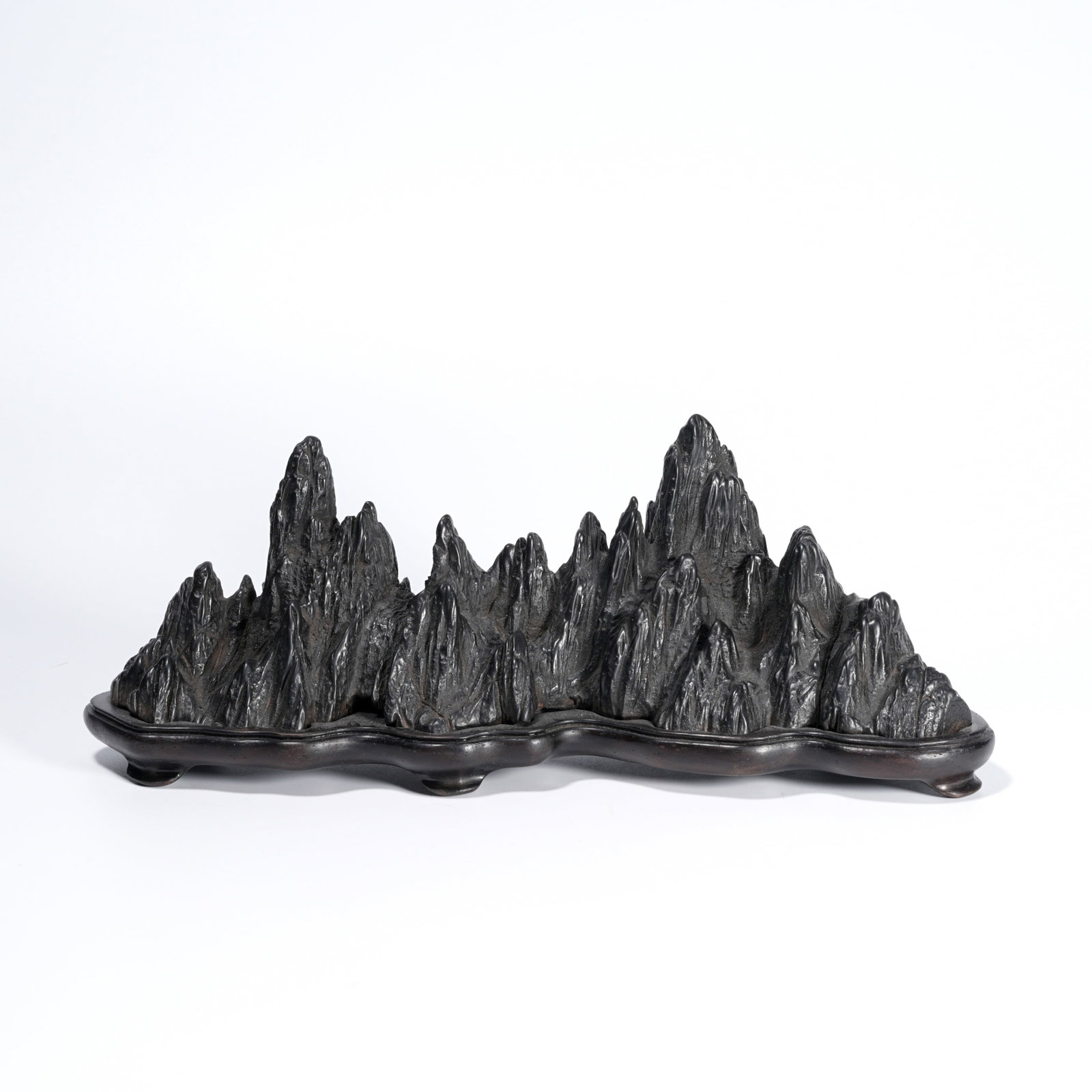 A STONE CARVED MOUNTAIN-FORM ORNAMENT: Stone Carved Mountain-Form Ornament