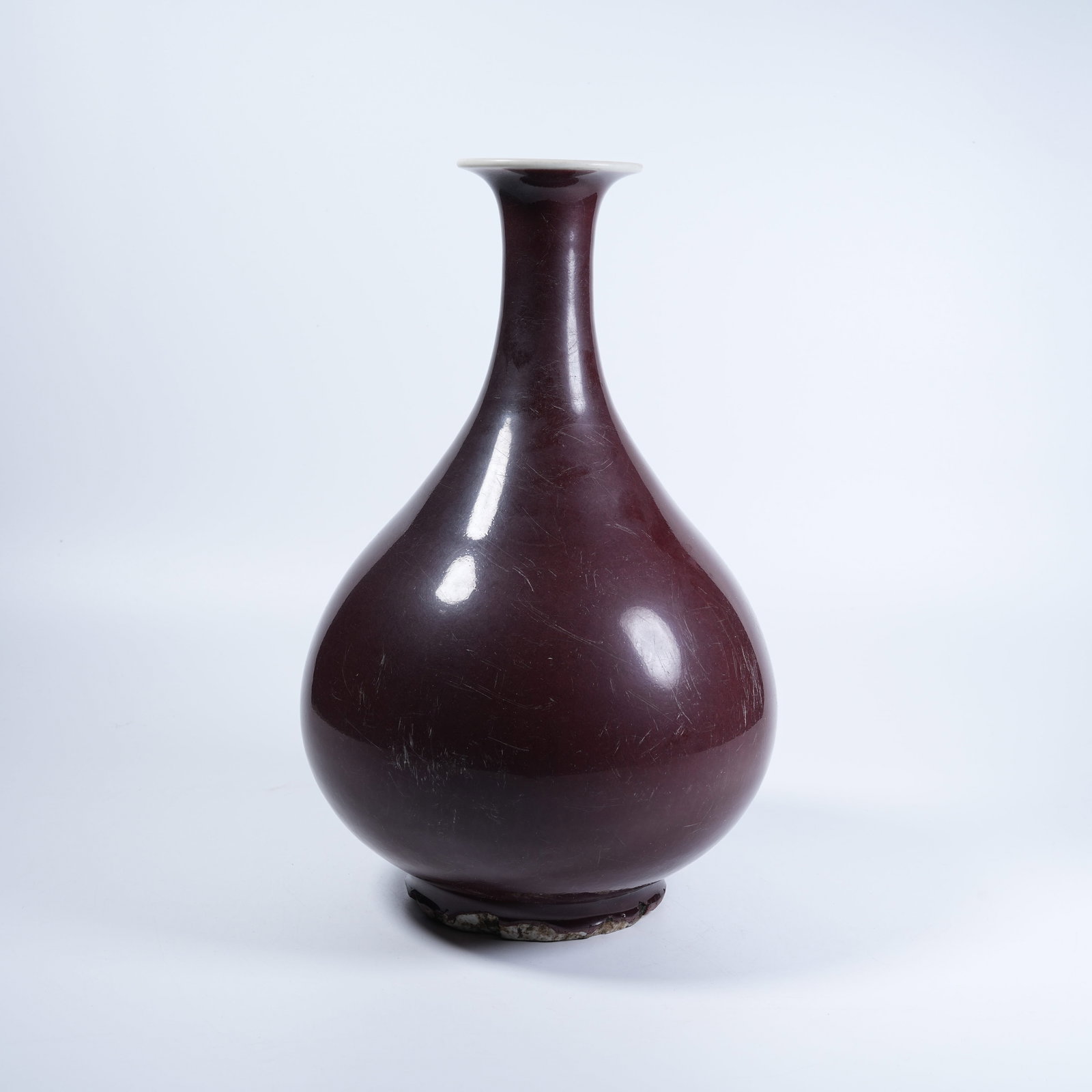 A YUHUCHUN VASE WITH SACRIFICE RED GLAZE: Yuhuchun Vase with Sacrifice Red Glaze