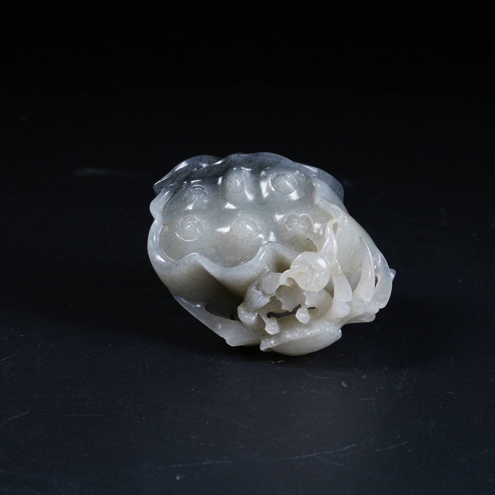 A HETIAN BLUE-AND-WHITE SEED JADE HANGING ORNAMENT SYMBOLIZING WEALTH FROM ALL DIRECTIONS (1 of 9)