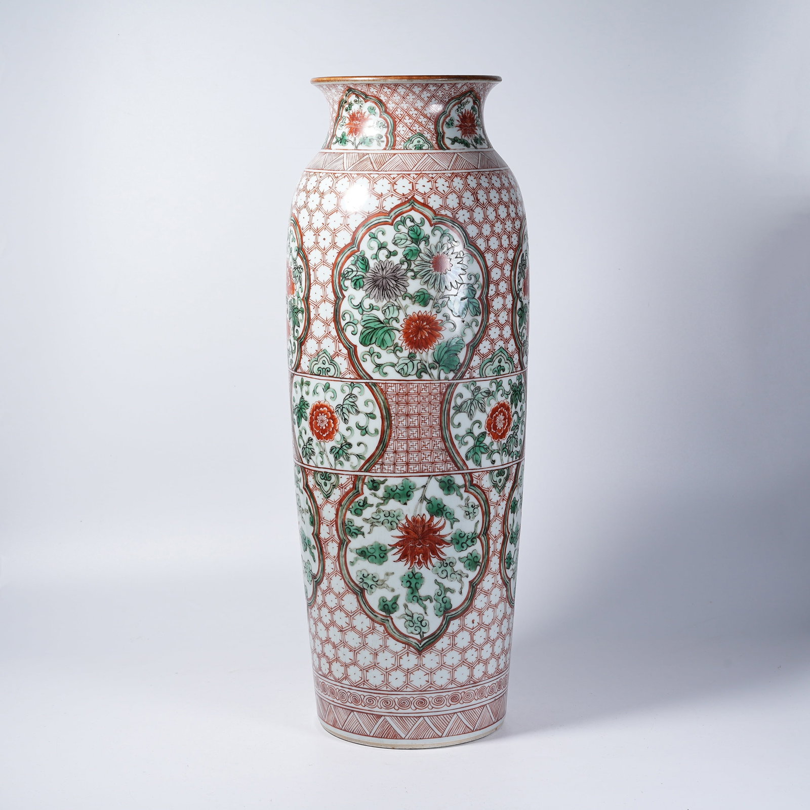 A CYLINDRICAL VASE WITH RED AND GREEN FLORAL PATTERN (1 of 9)