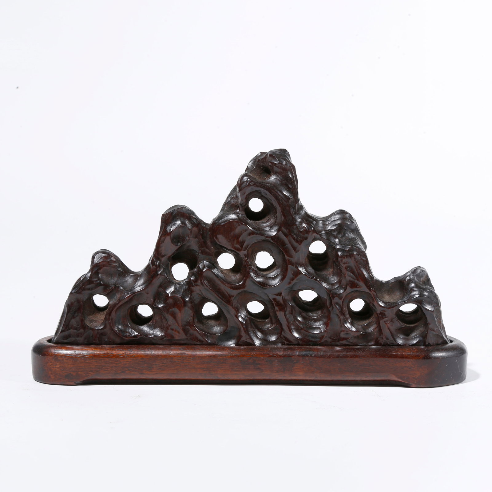 A RED SANDALWOOD CARVED MOUNTAIN-SHAPED BRUSH REST (1 of 9)