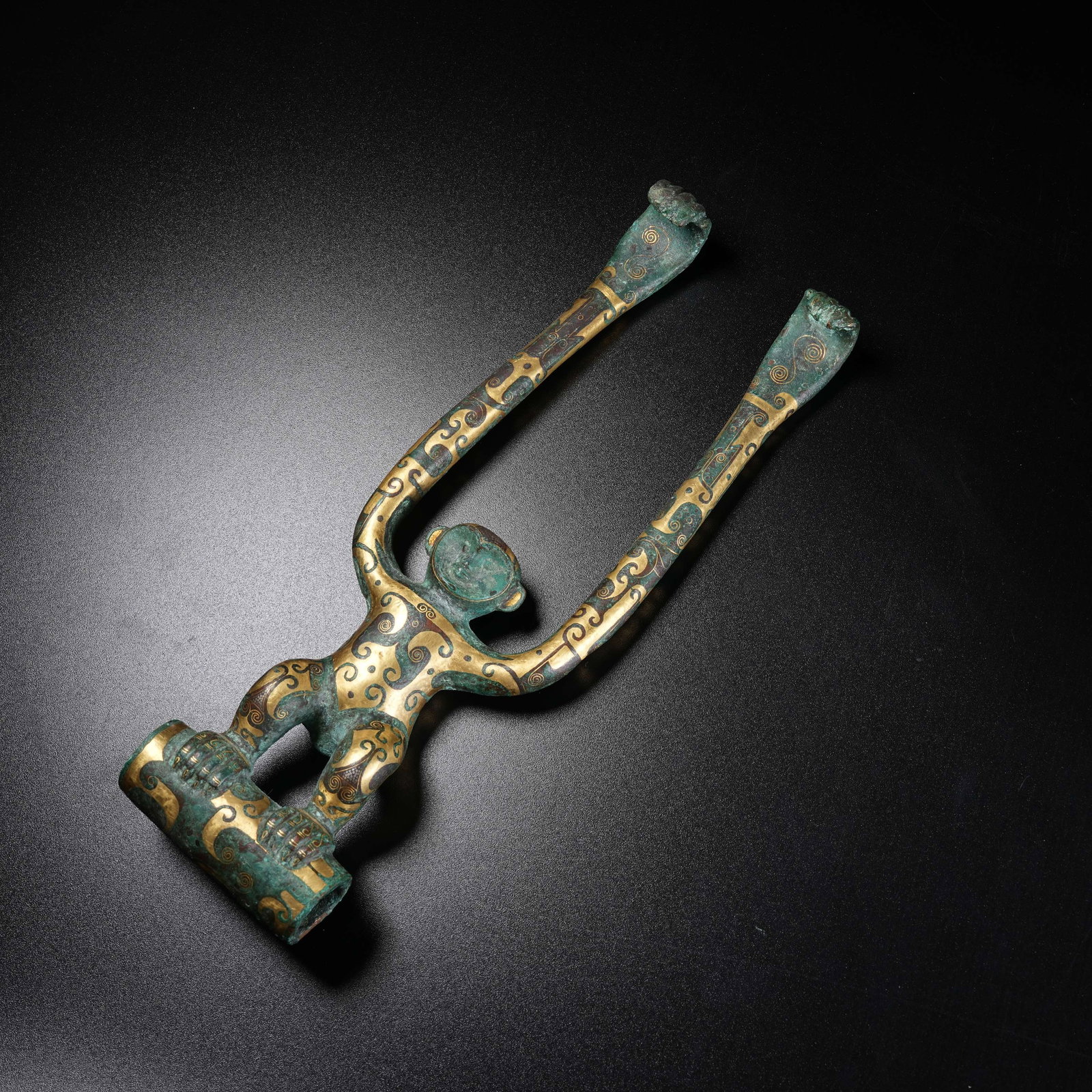 A BRONZE PENDANT WITH DIVINE FIGURE INLAID WITH GOLD AND SILVER: Bronze Pendant with Divine Figure Inlaid with Gold and Silver