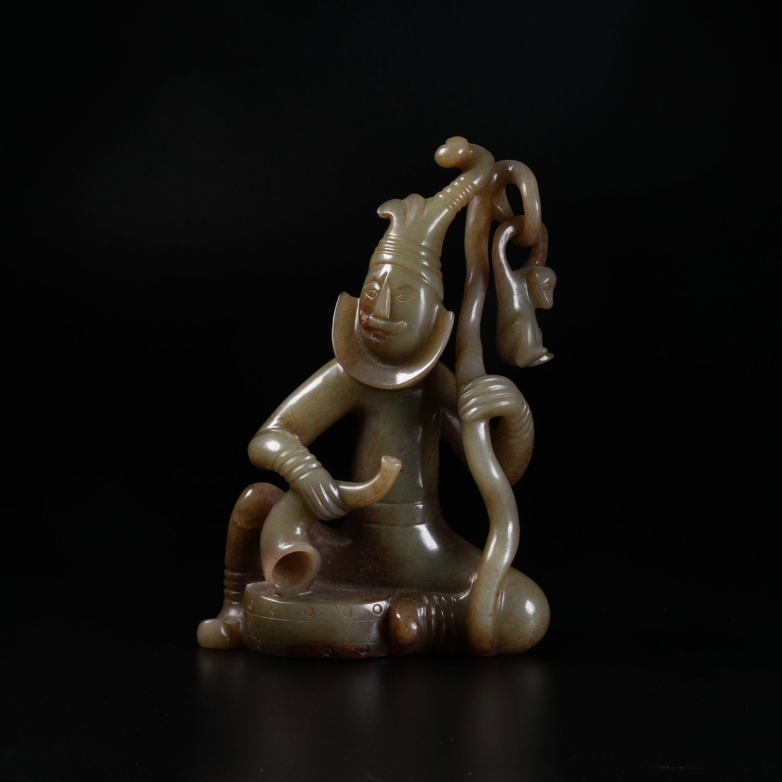 A ANCIENT JADE ORNAMENT OF HU PEOPLE PLAYING WITH MONKEYS (1 of 10)