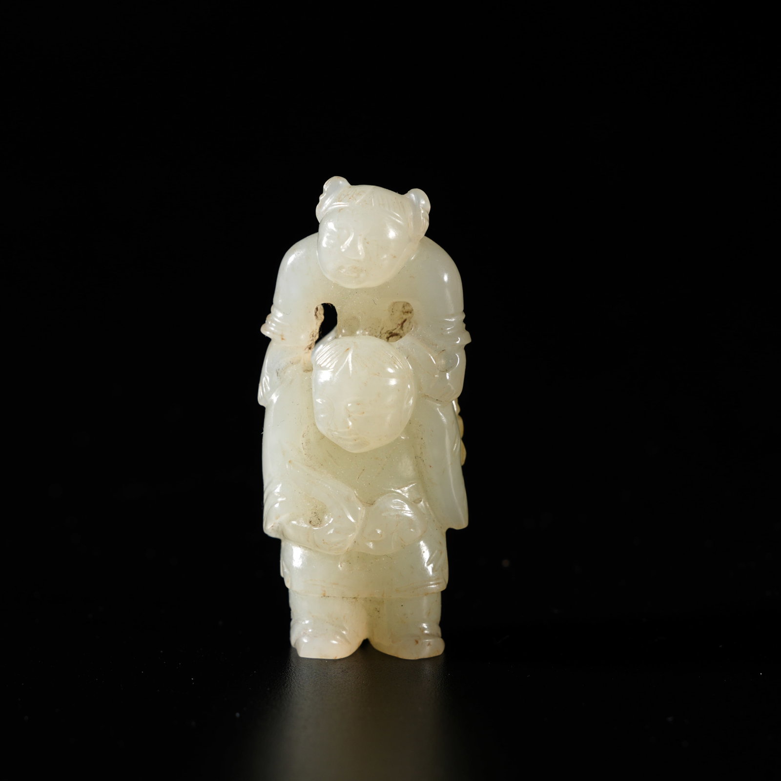 A HETIAN JADE CARVED BOY-FORM ORNAMENT (1 of 9)
