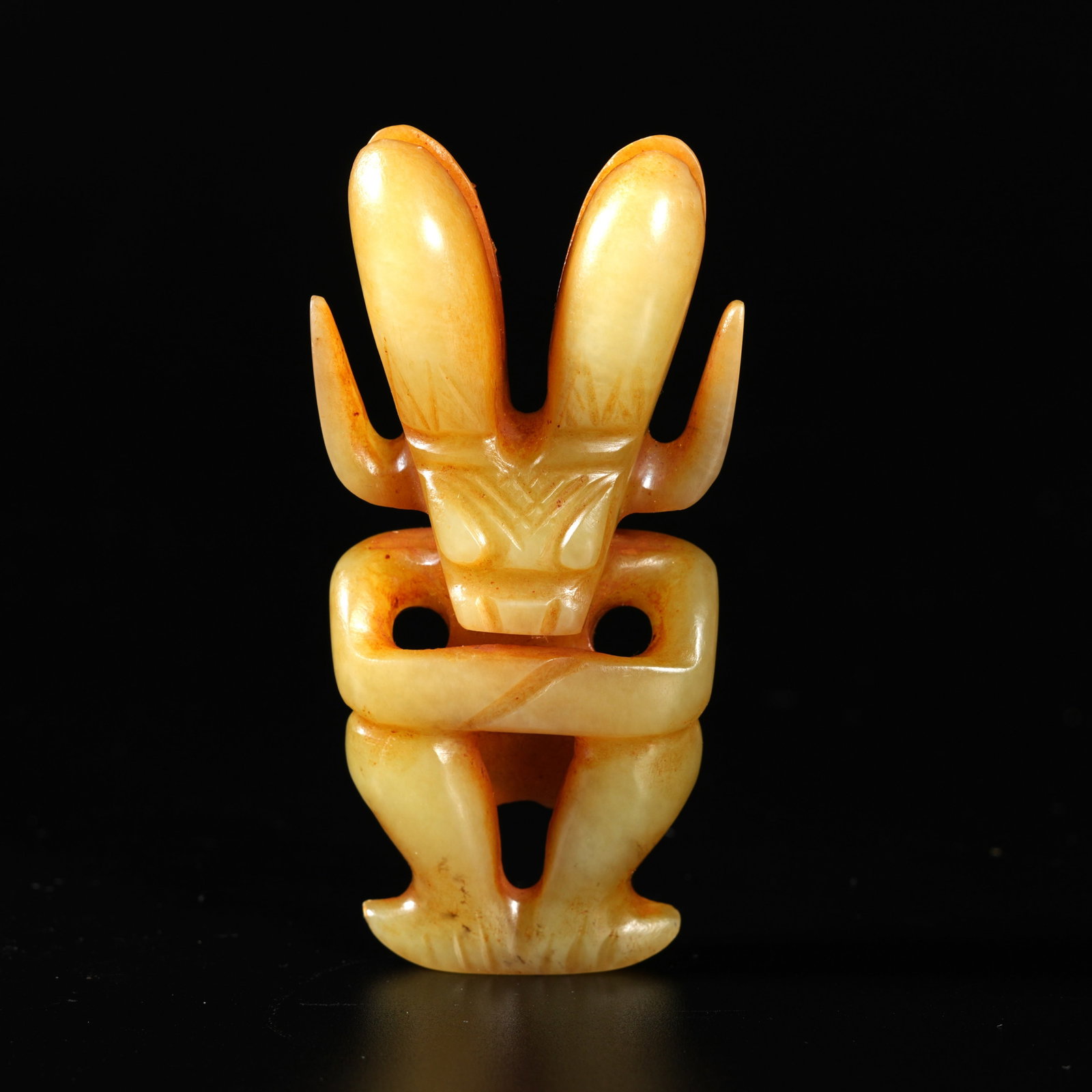 A ARCHAIC JADE CARVED SUN DEITY ORNAMENT: Archaic Jade Carved Sun Deity Ornament