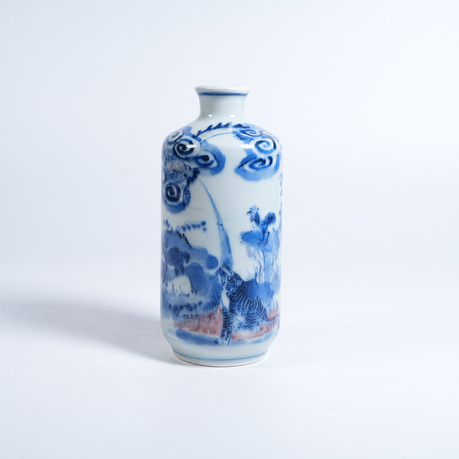 A BLUE AND WHITE UNDERGLAZE RED SNUFF BOTTLE WITH TWELVE ZODIAC PATTERN (1 of 9)