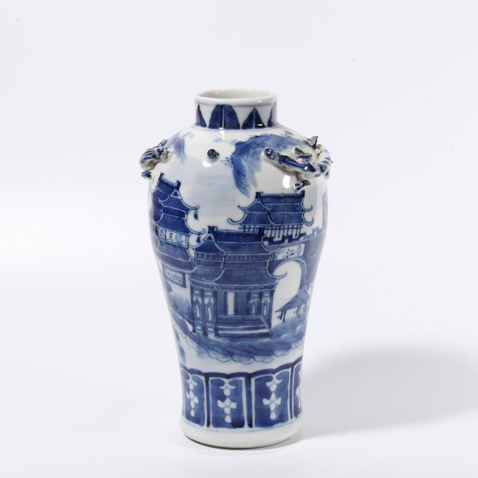A BLUE AND WHITE VASE WITH LANDSCAPE AND DRAGON PATTERNS: Blue and White Vase with Landscape and Dragon Patterns