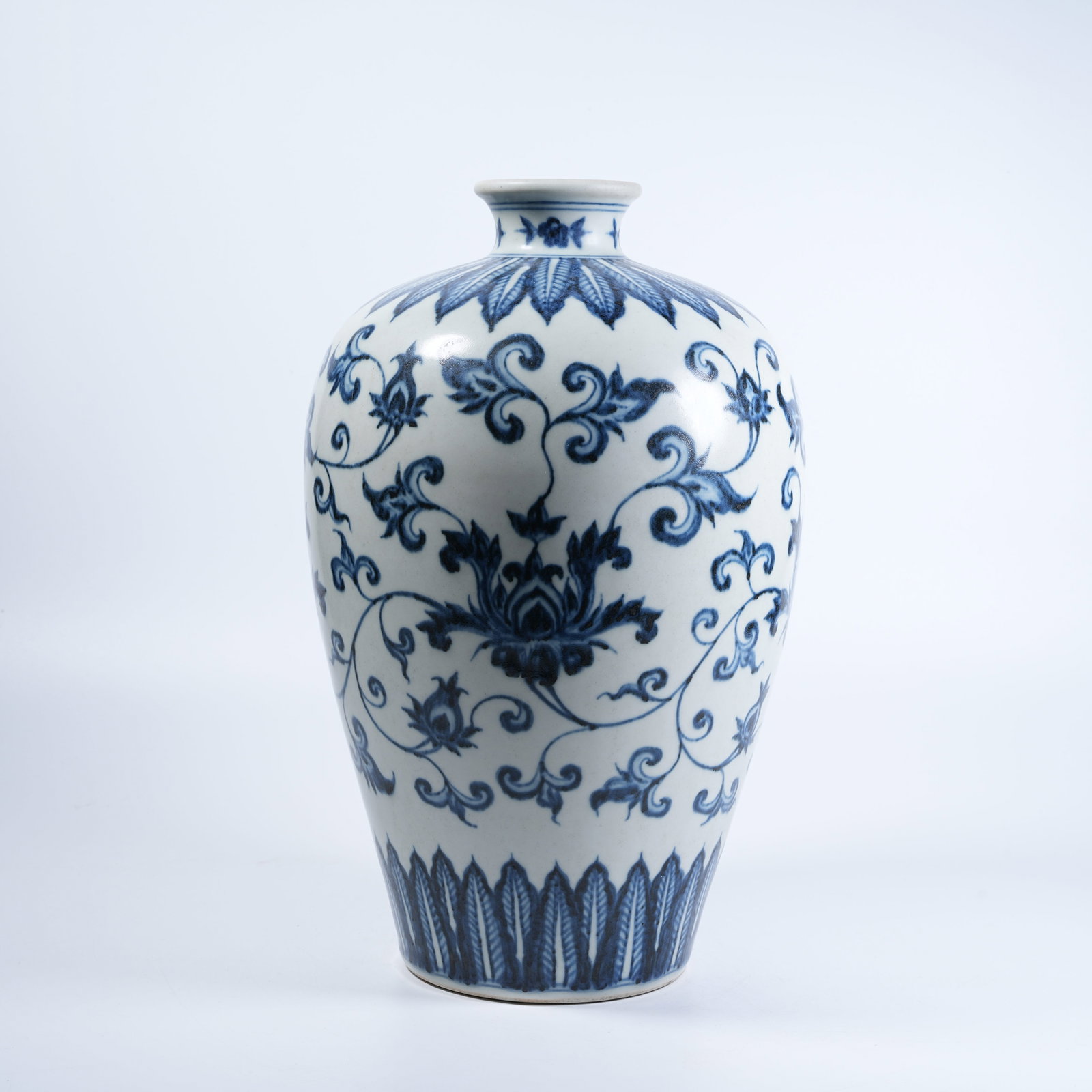 A PLUM VASE WITH BLUE AND WHITE INTERTWINED FLORAL PATTERNS: Plum Vase with Blue and White Intertwined Floral Patterns