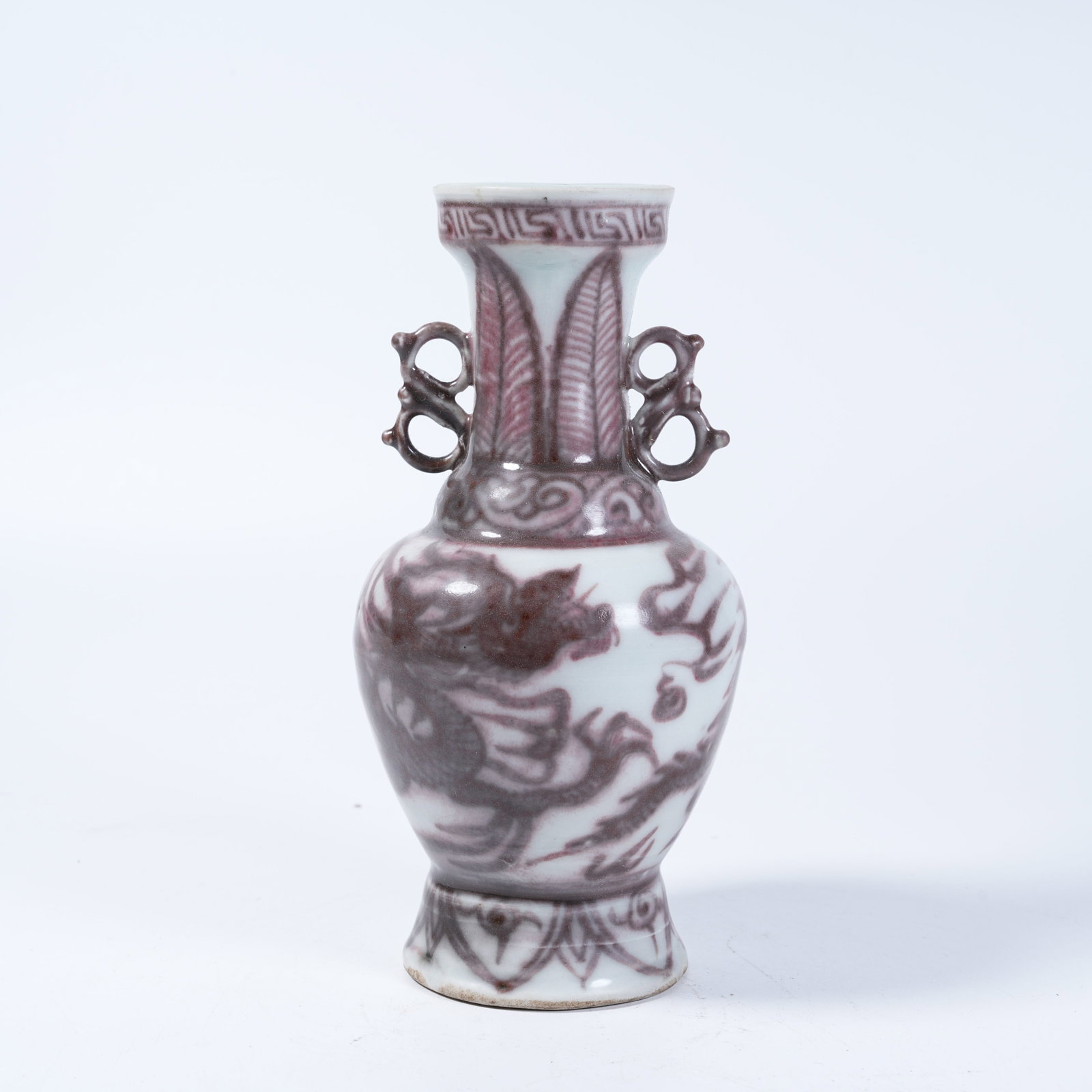 A TWO-EARED VASE WITH UNDERGLAZE RED CLOUD DRAGON MOTIFS (1 of 10)