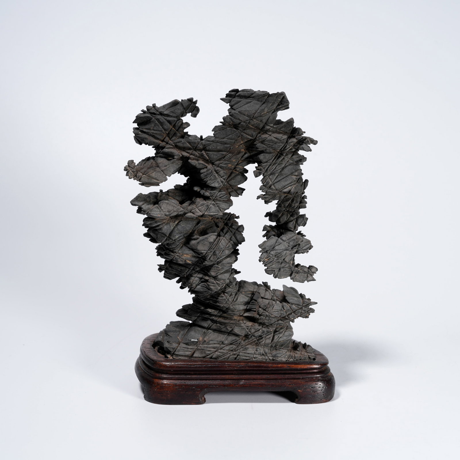 A STONE CARVED MOUNTAIN-FORM ORNAMENT: Stone Carved Mountain-Form Ornament