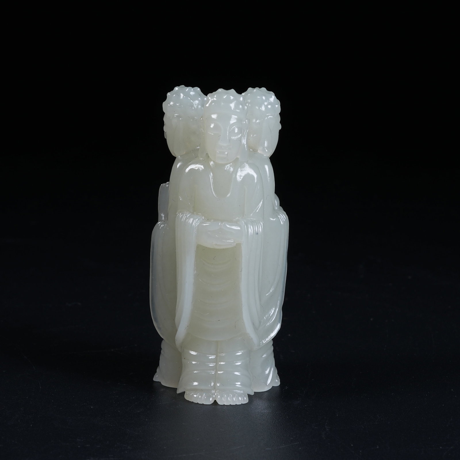 A HETIAN JADE ORNAMENT OF THREE BUDDHAS (1 of 8)