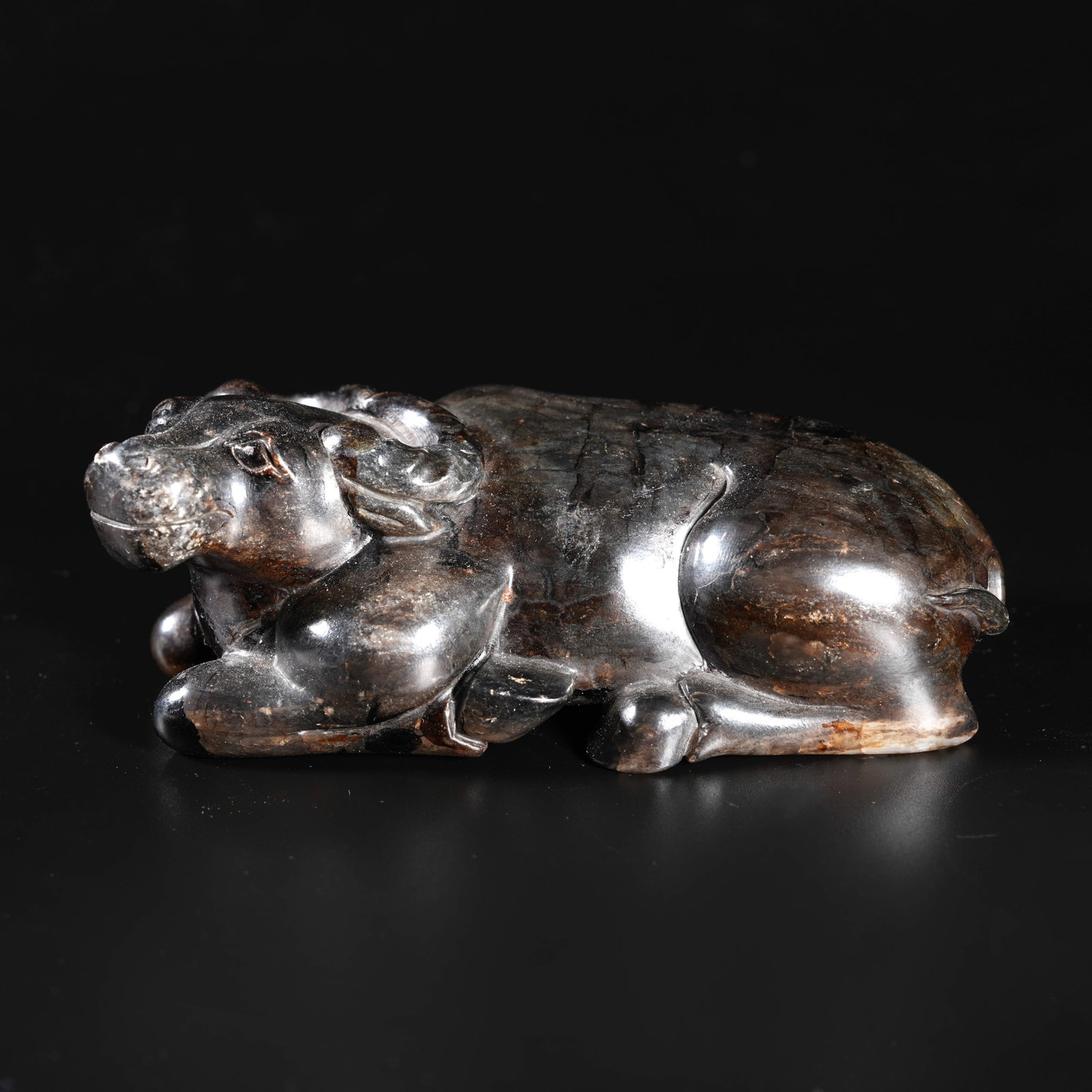 A HETIAN JADE CARVED HERDING OX–FORM ORNAMENT (1 of 10)