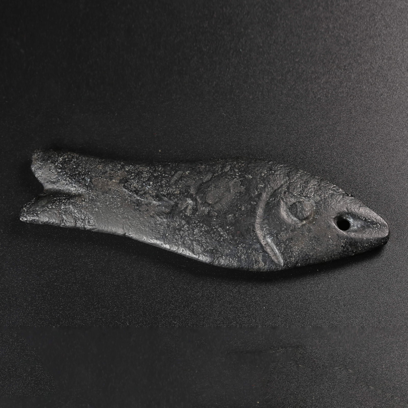 A ARCHAIC JADE FISH PENDANT: Archaic jade fish pendant
