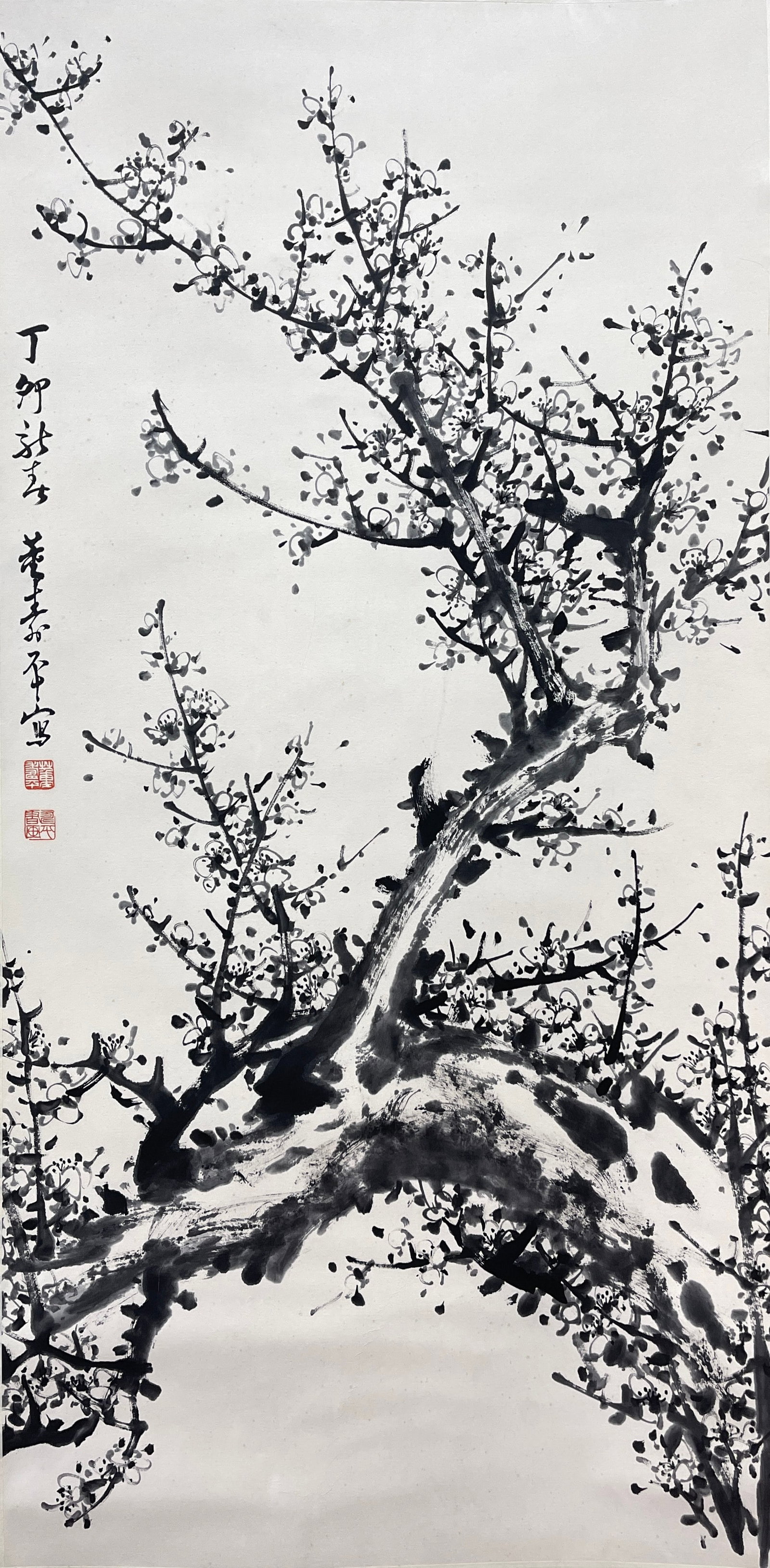 A VERTICAL SCROLL OF INK PLUM BLOSSOMS ON PAPER BY DONG SHOUPING.董壽平: Vertical Scroll of Ink Plum Blossoms on Paper by Dong Shouping.董壽平