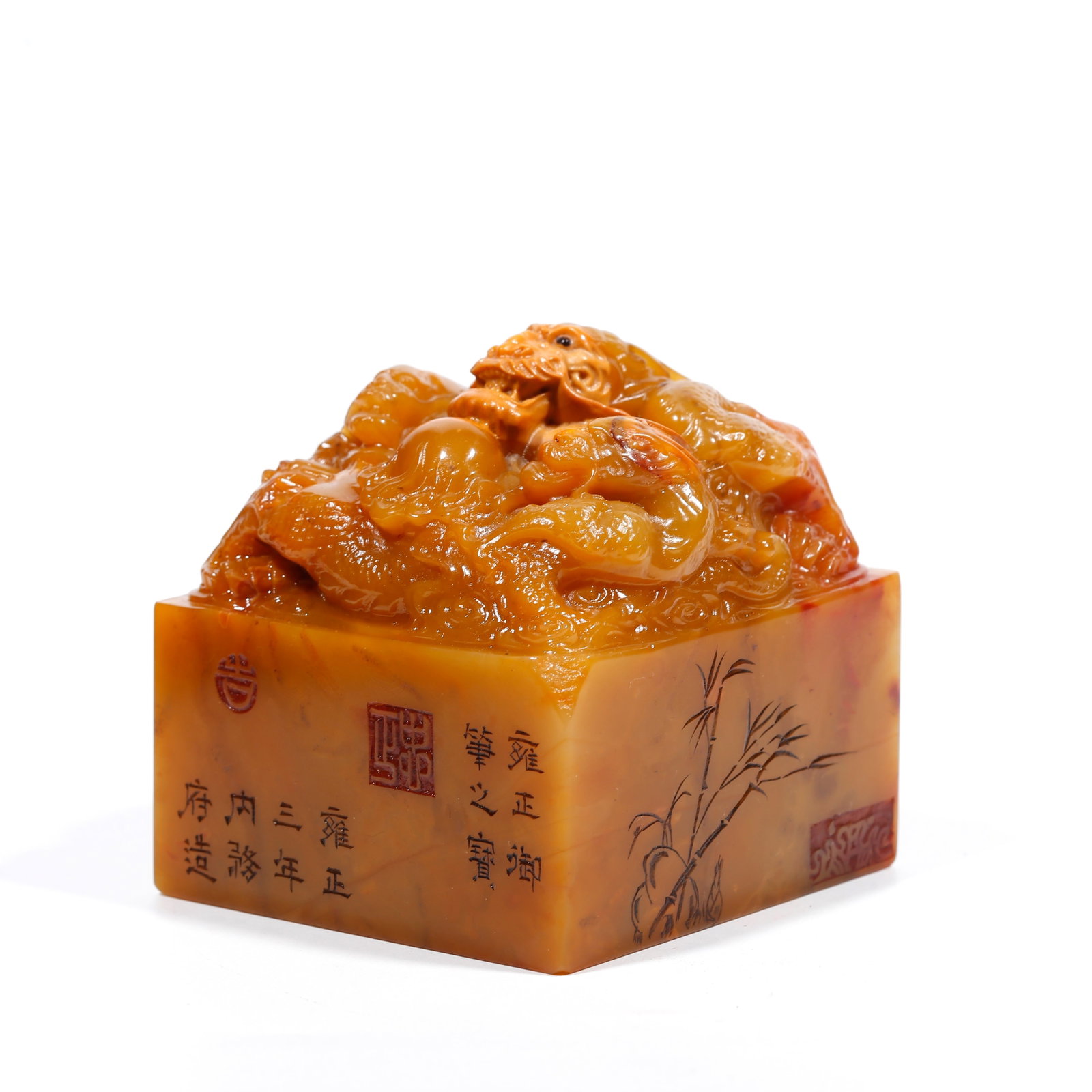 A SHOUSHAN TIANHUANG STONE SEAL CARVED WITH THREE DRAGON PATTERNS: Shoushan Tianhuang Stone Seal Carved with Three Dragon Patterns