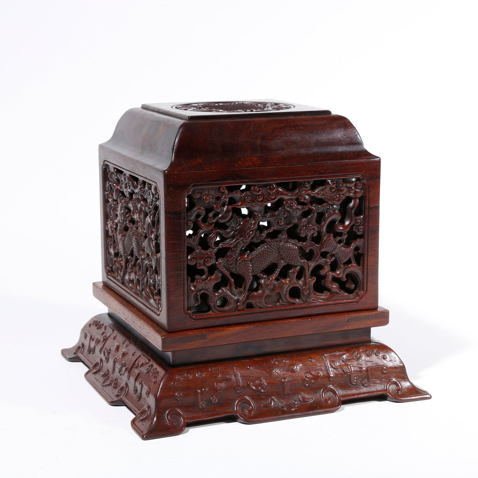 A RED SANDALWOOD CARVED HOLLOW COVERED BOX WITH QILIN PATTERN: Red Sandalwood Carved Hollow Covered Box with Qilin Pattern