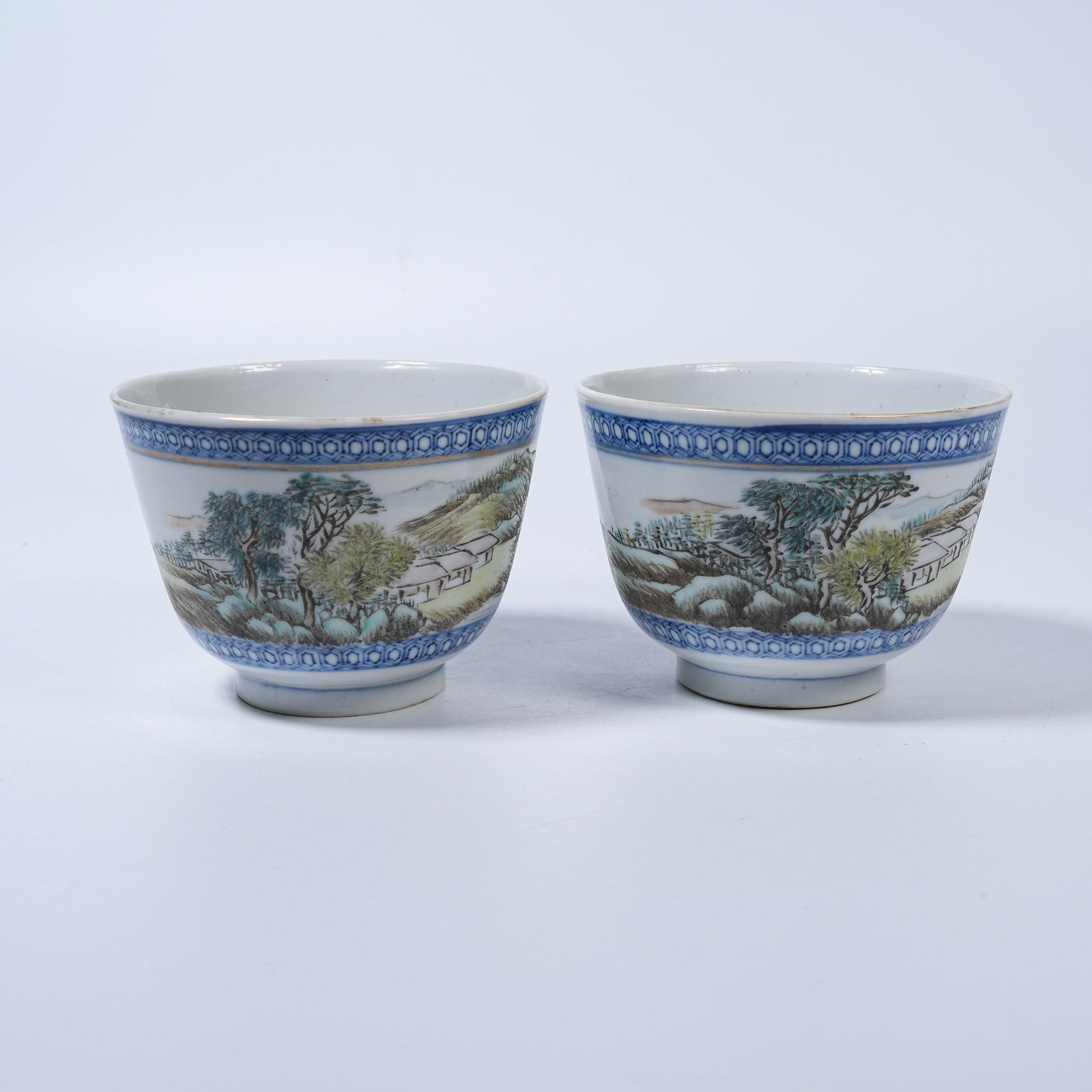 A SET OF FAMILLE ROSE CUPS WITH LANDSCAPE AND PAVILION PATTERNS: Set of Famille Rose Cups with Landscape and Pavilion Patterns