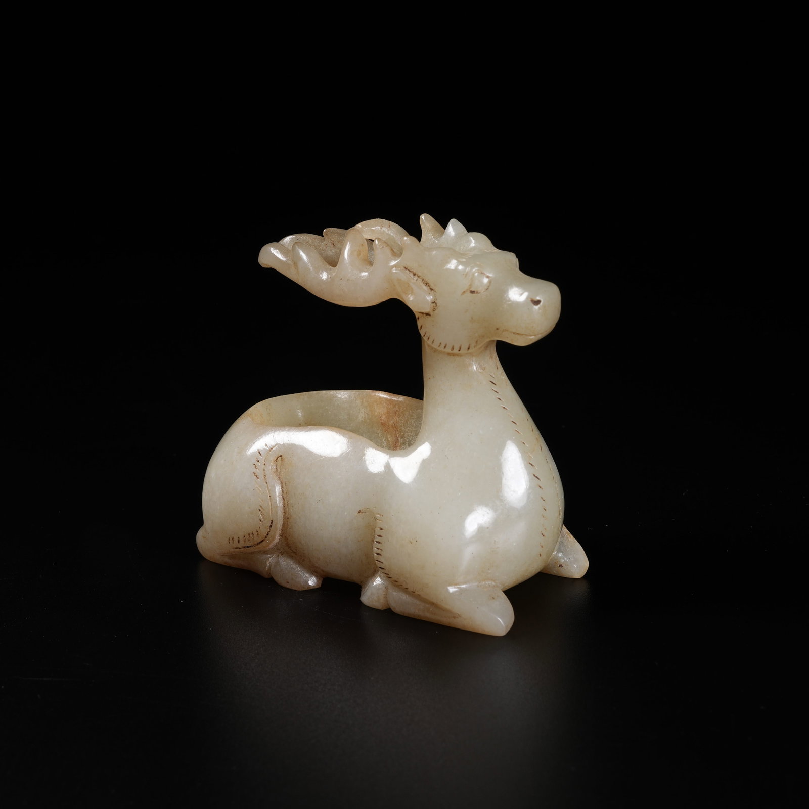 A ANCIENT JADE BRUSH WASHER IN RECUMBENT DEER FORM (1 of 8)