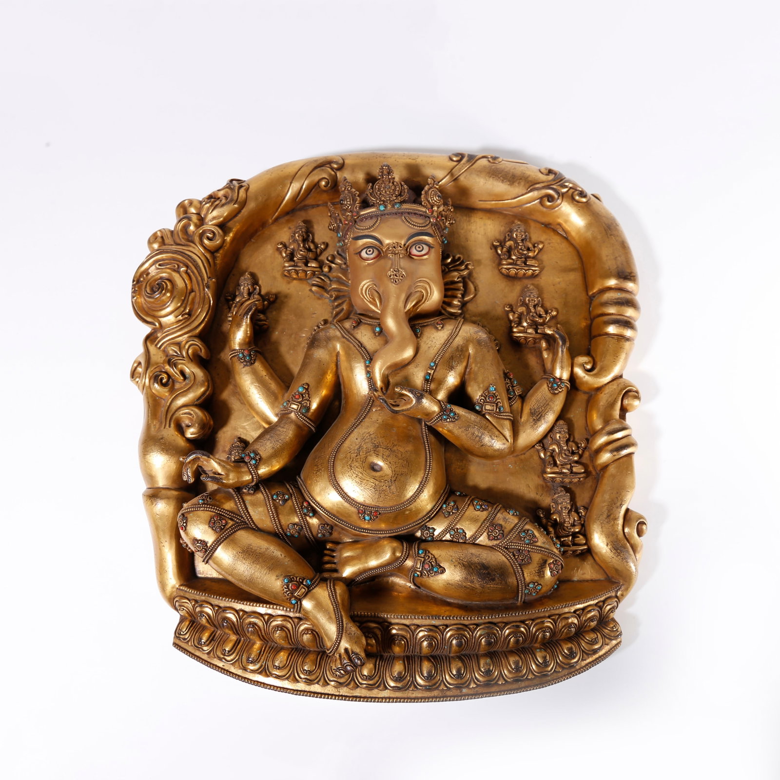 A GILT BRONZE PLAQUE OF GANESHA GOD OF WEALTH (1 of 9)