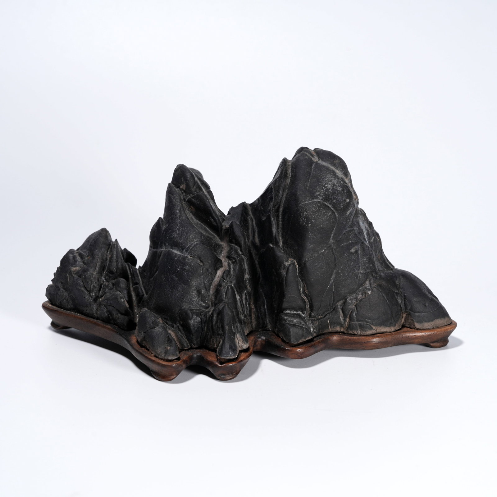 A STONE CARVED MOUNTAIN-FORM ORNAMENT: Stone Carved Mountain-Form Ornament