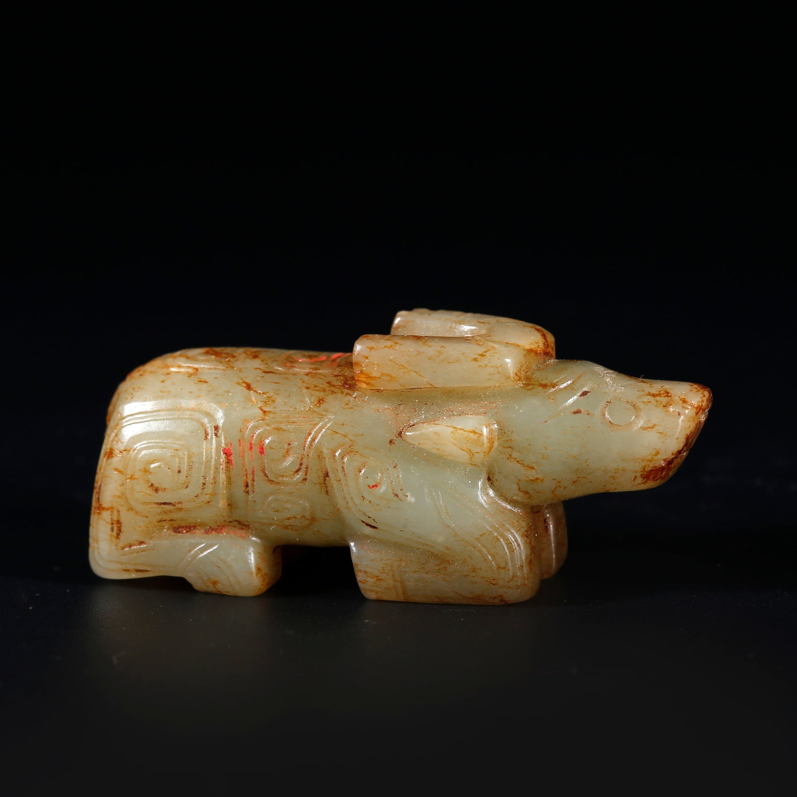 A ANCIENT JADE OX ORNAMENT (1 of 9)