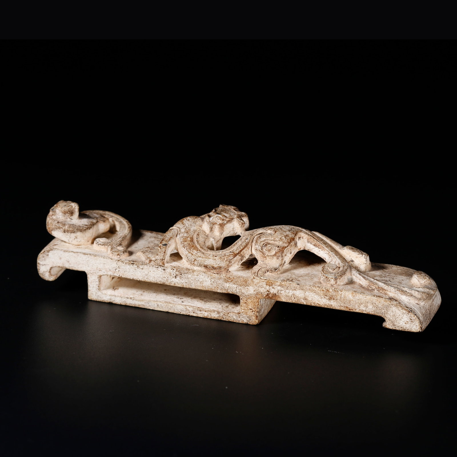 A ANCIENT JADE SWORD FITTINGS CARVED WITH DRAGON MOTIFS: Ancient Jade Sword Fittings Carved with Dragon Motifs